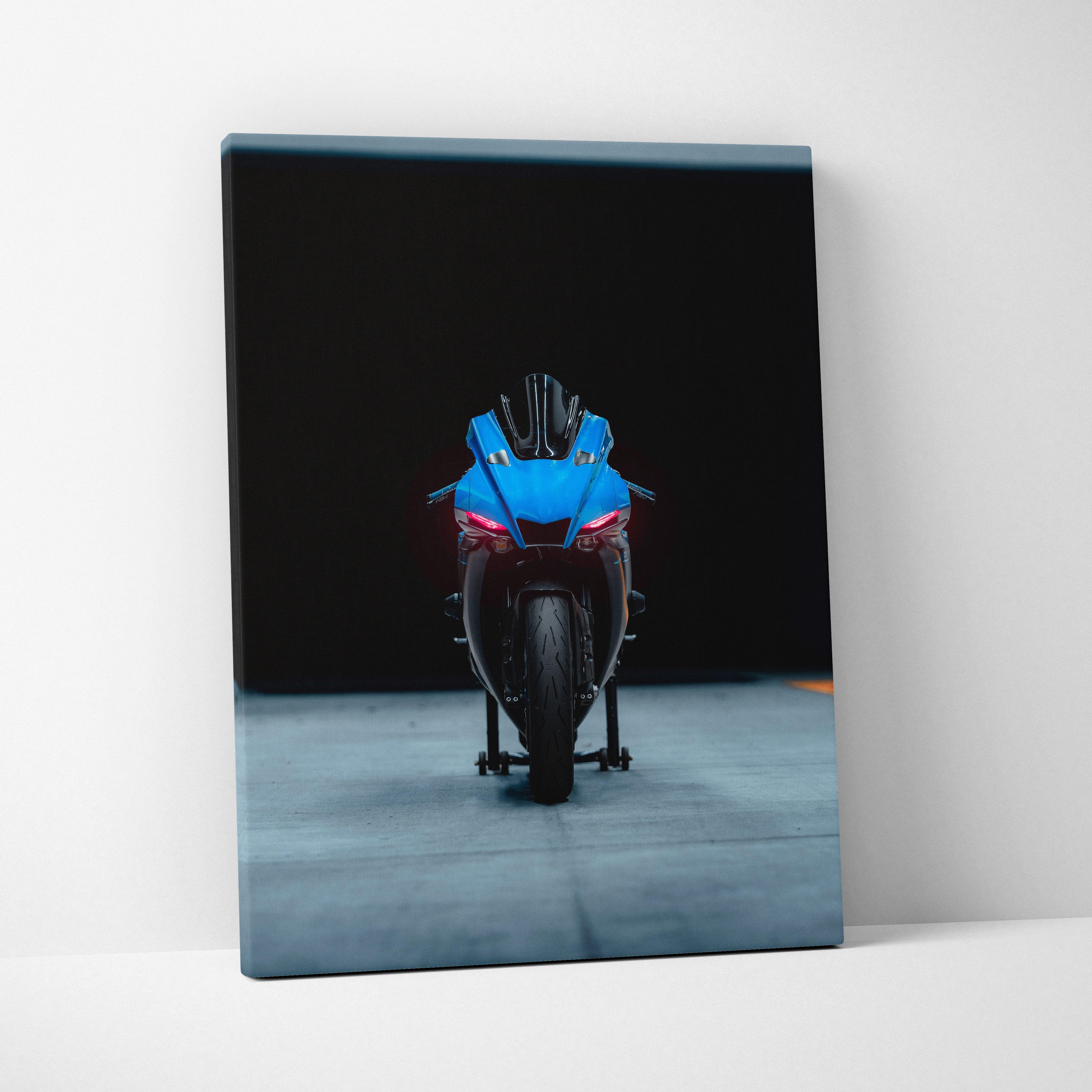 Yamaha R1 motorcycle front view on vertical canvas wall art with black background.