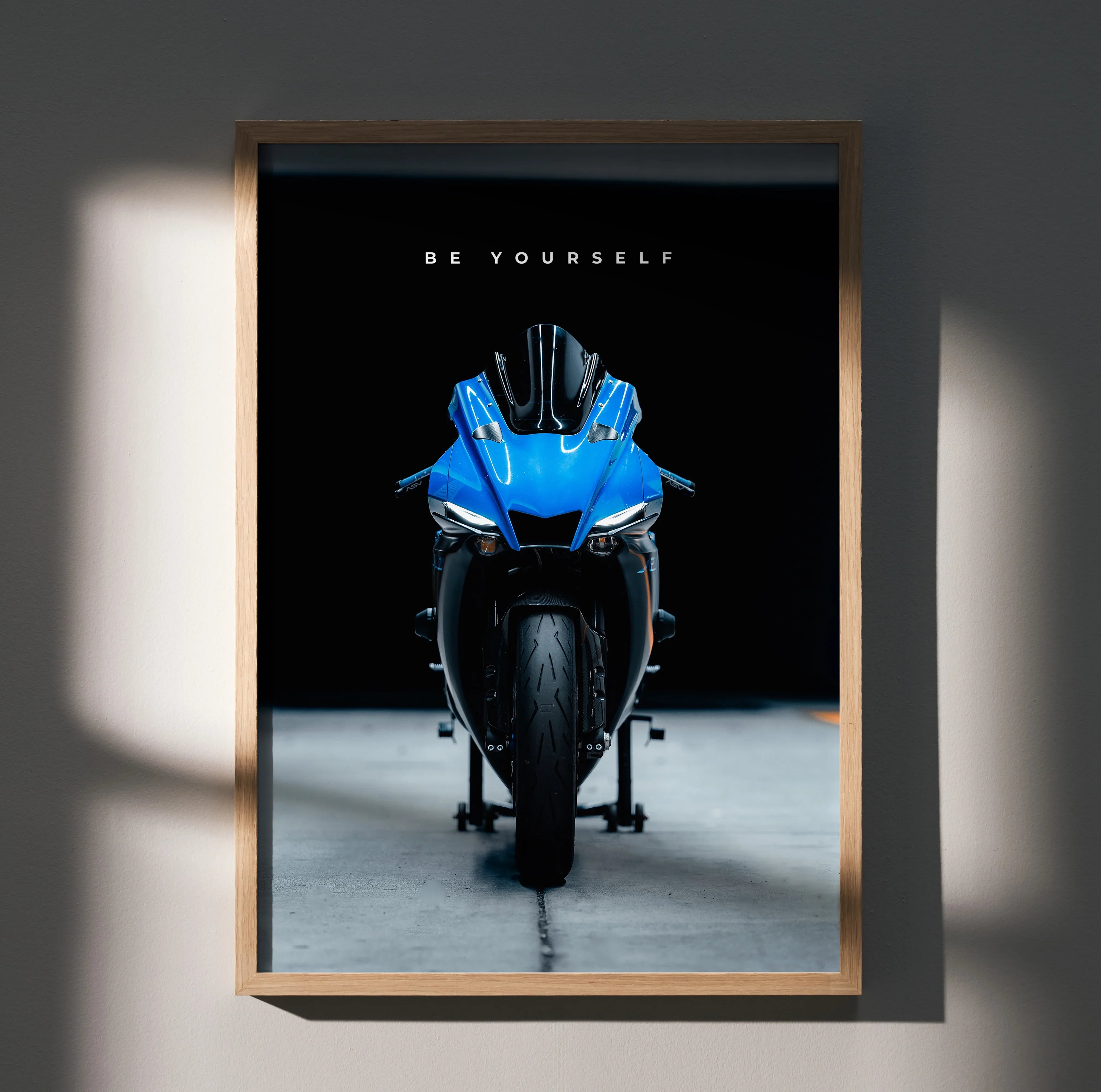 Motivational poster wall art featuring a front view of a blue Yamaha R1 motorcycle on black background with "Be Yourself".