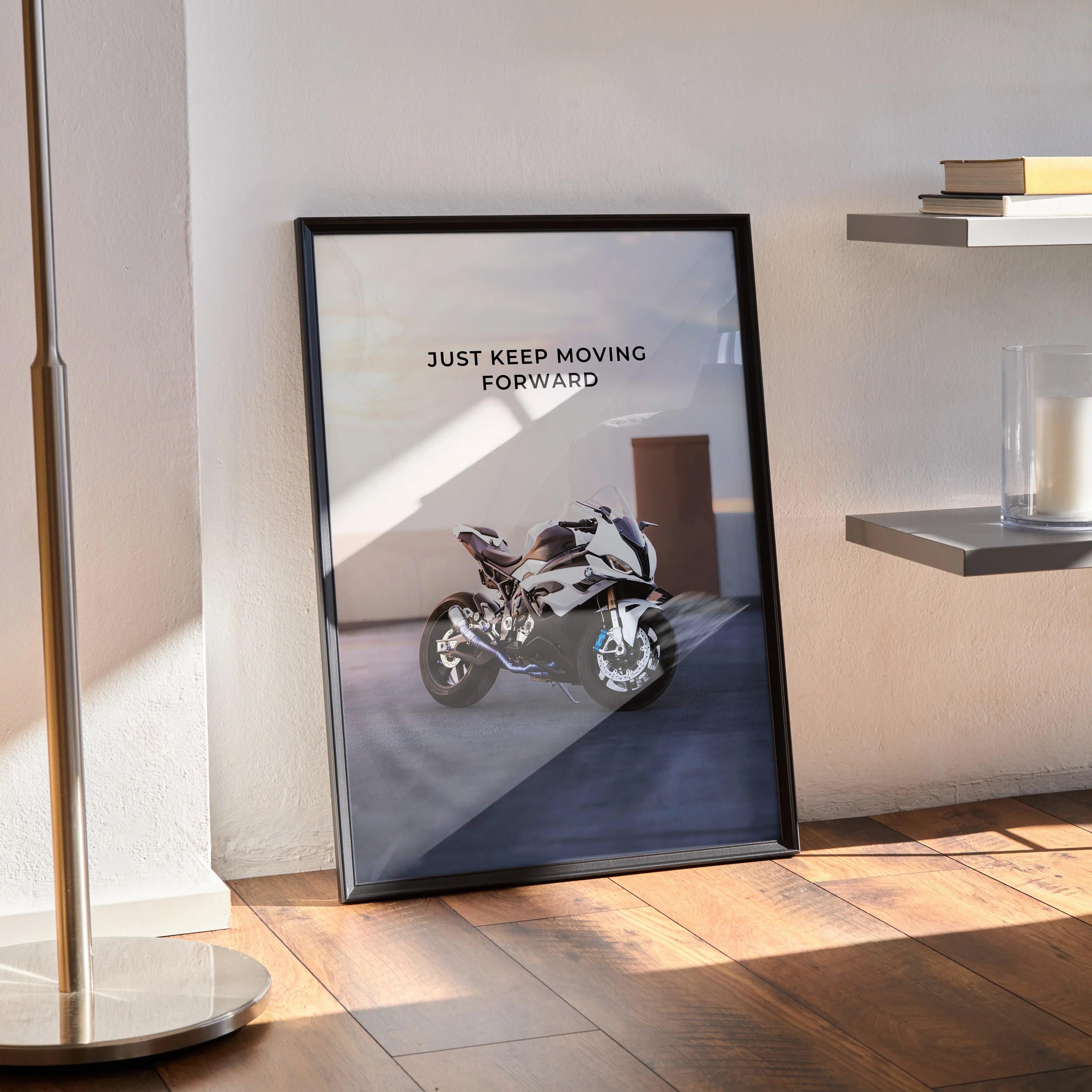 BMW S1000RR motorcycle poster with motivational text "Just Keep Moving Forward" in black frame wall art.