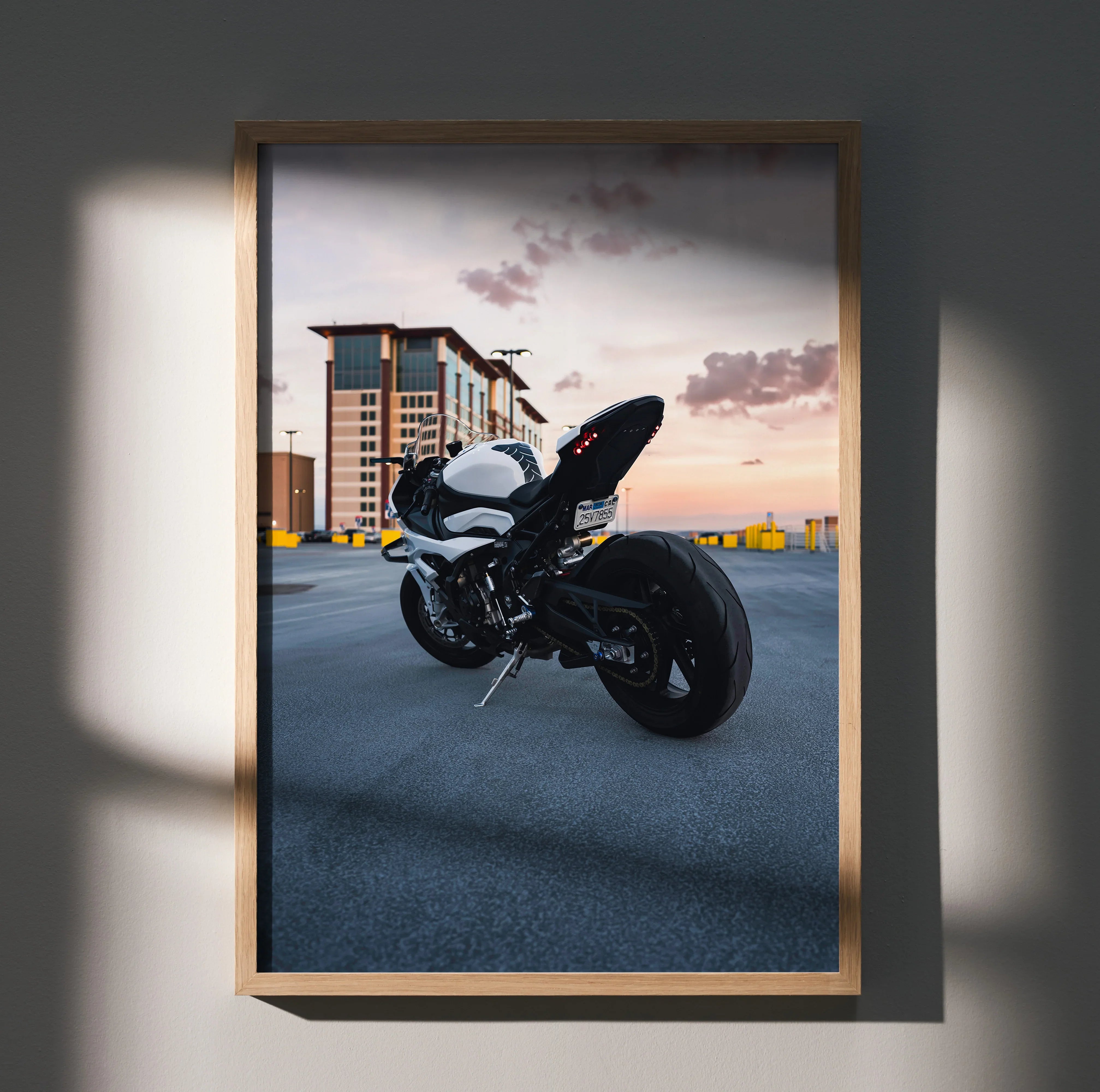 BMW S1000RR motorcycle poster with sunset background, premium satin wall art in wooden frame.