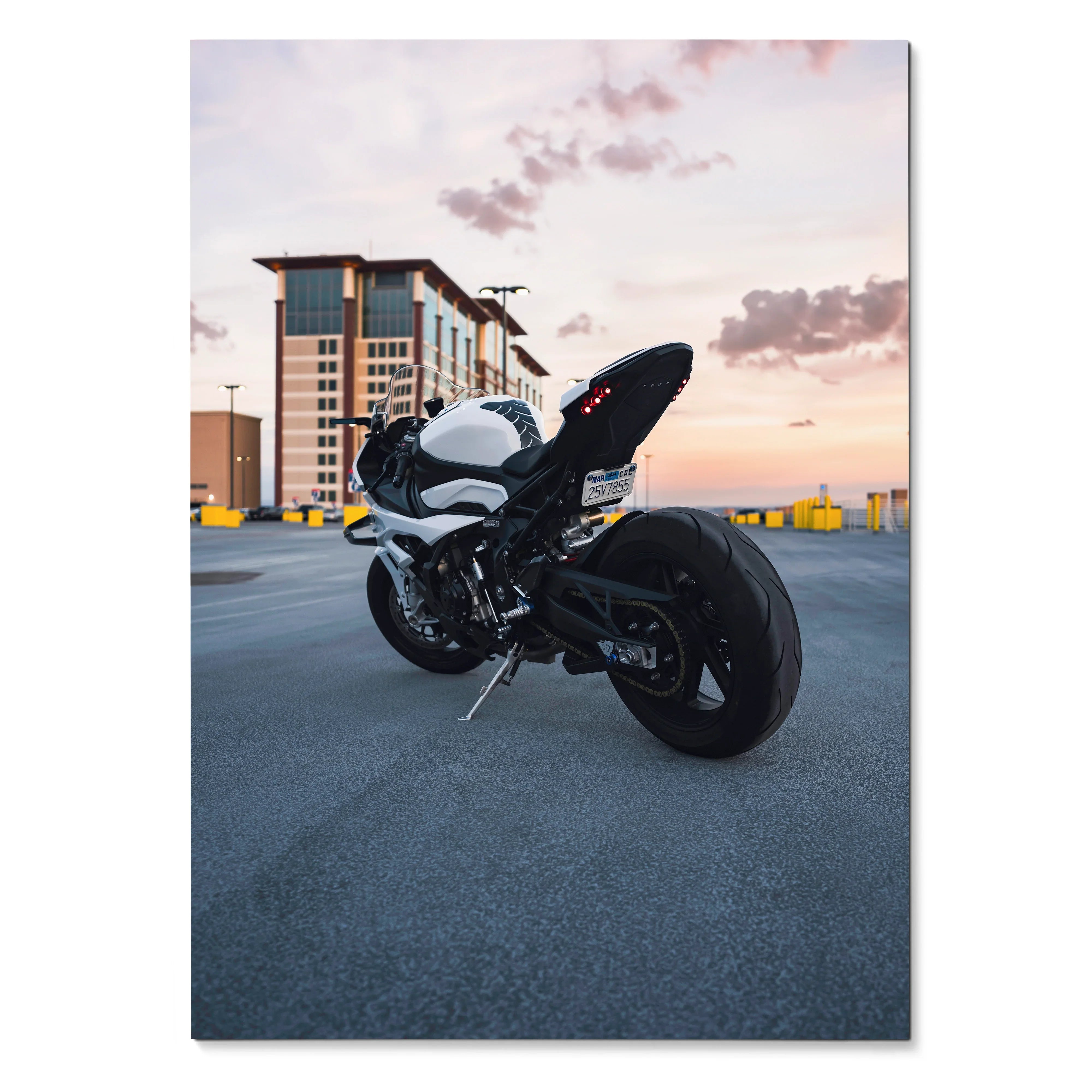 BMW S1000RR motorcycle poster with sunset sky background, urban rooftop wall art.