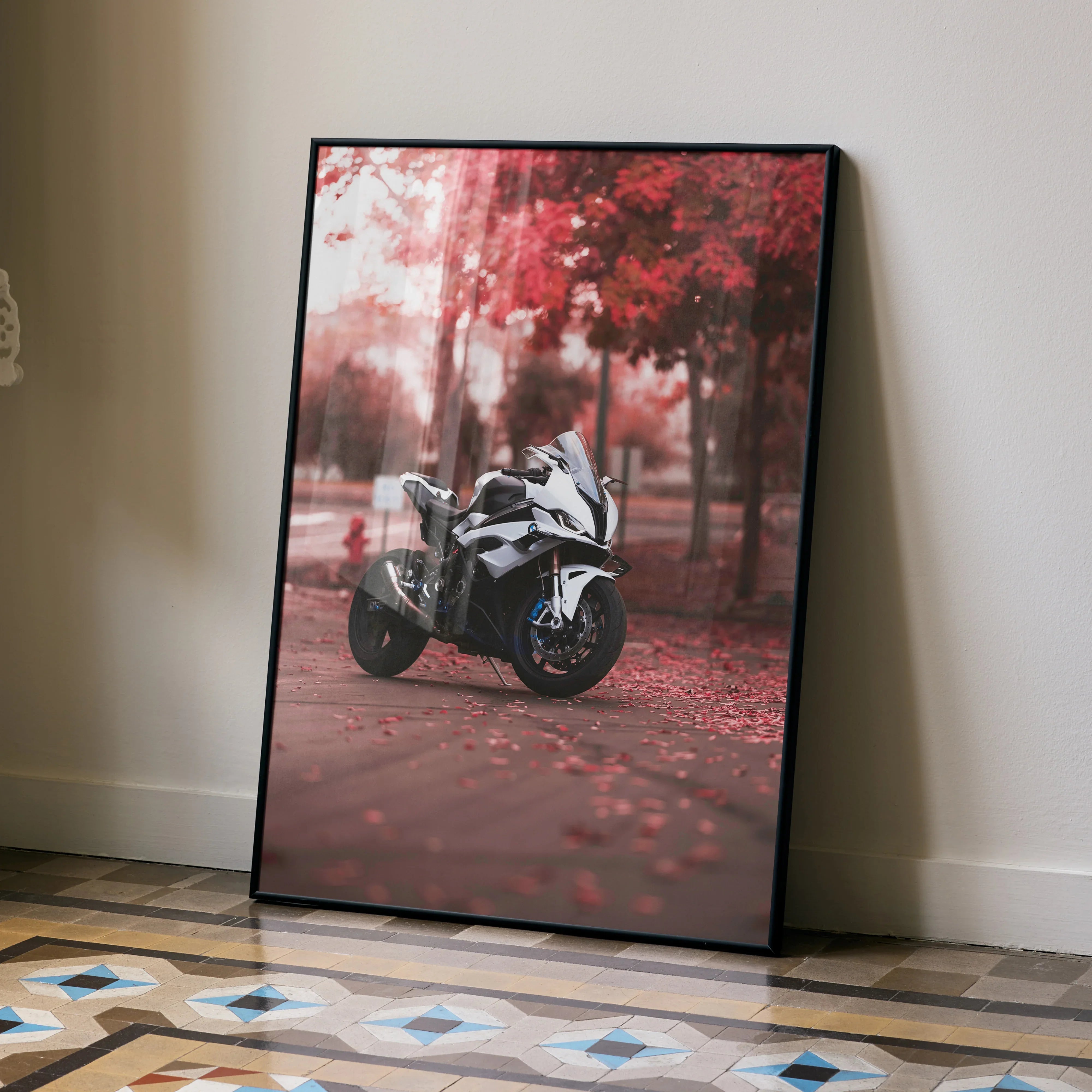 BMW S1000RR motorcycle poster with red autumn trees background wall art in black frame.