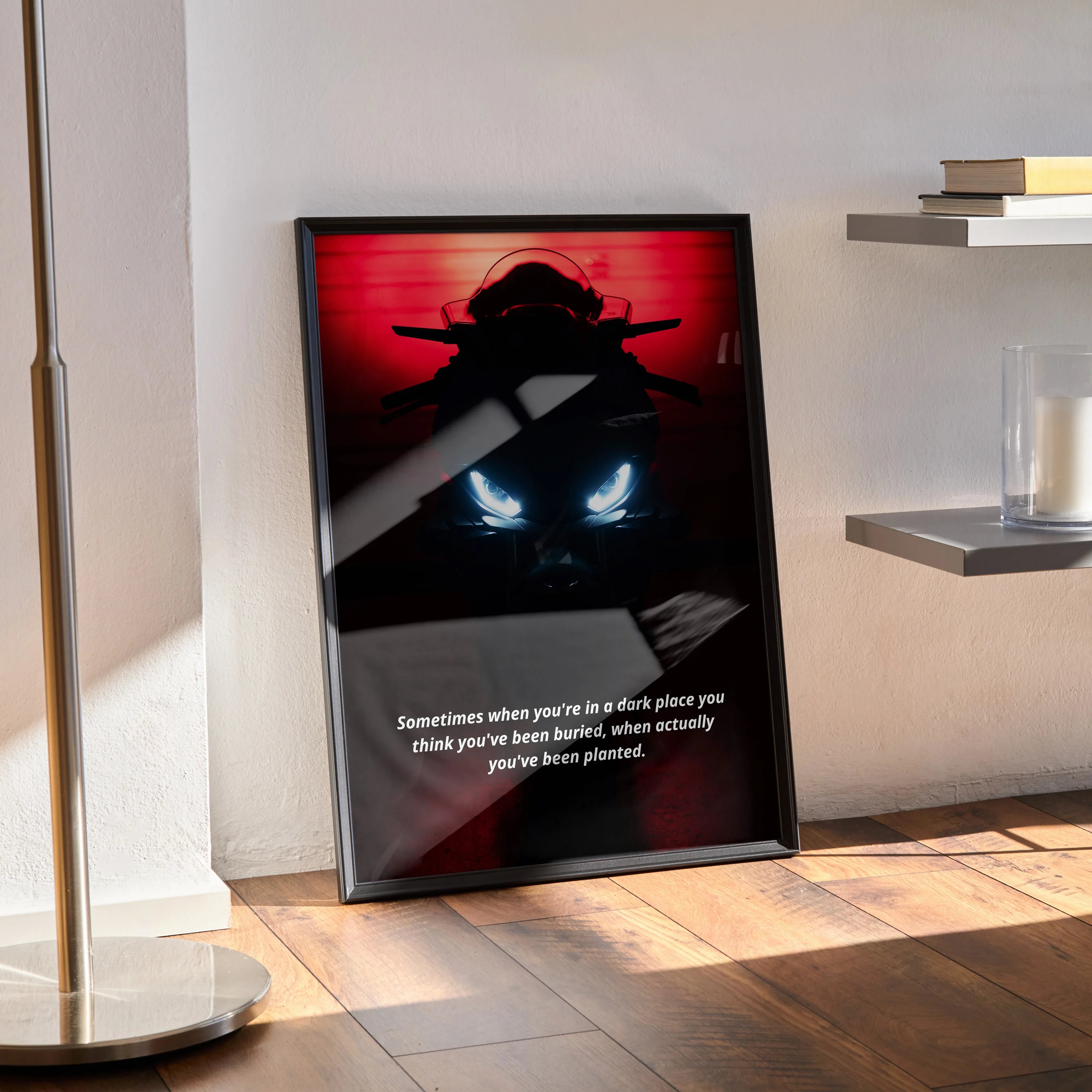 BMW S1000RR motorcycle poster with glowing headlights and motivational text wall art in black frame.