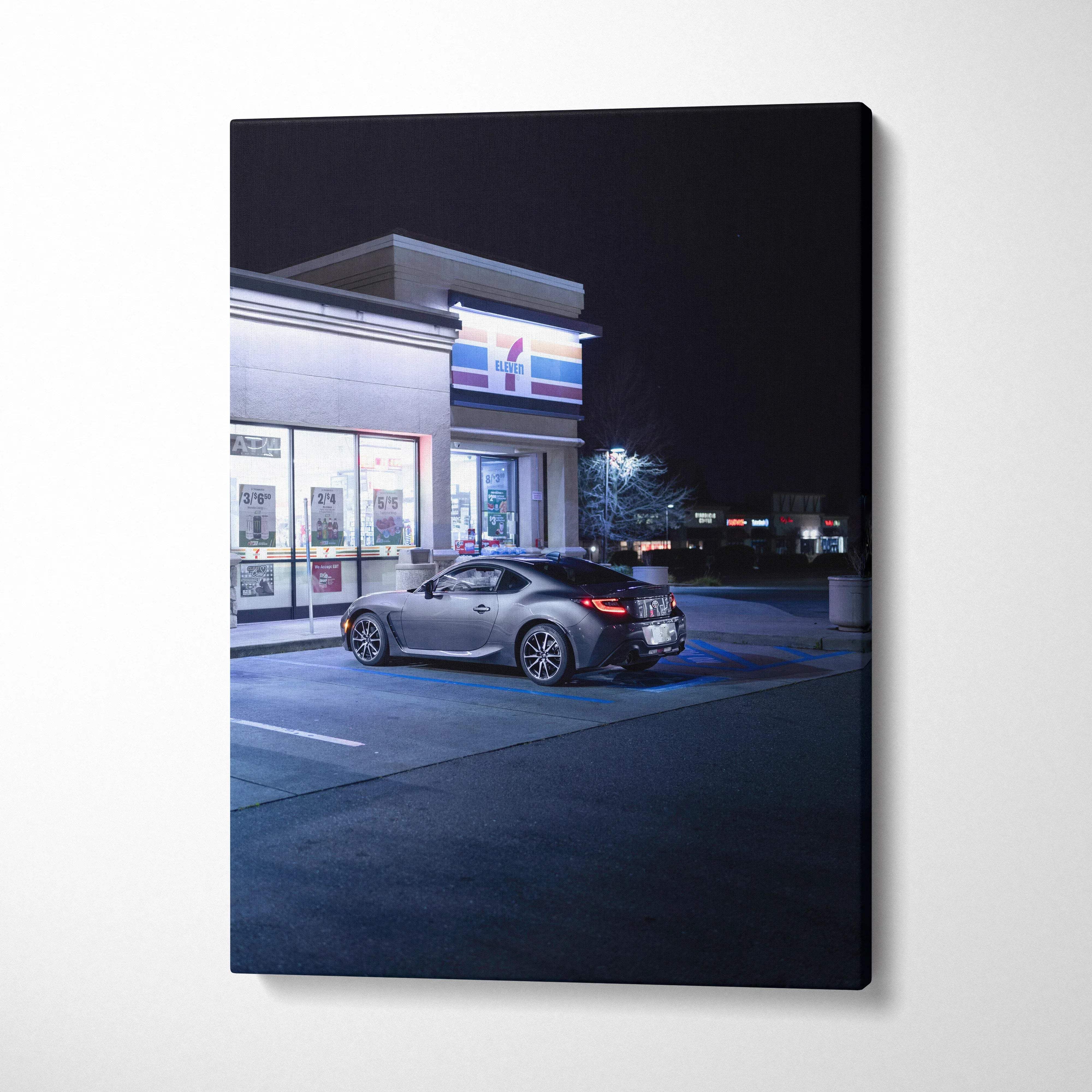 Toyota GR86 parked outside convenience store at night vertical canvas wall art.