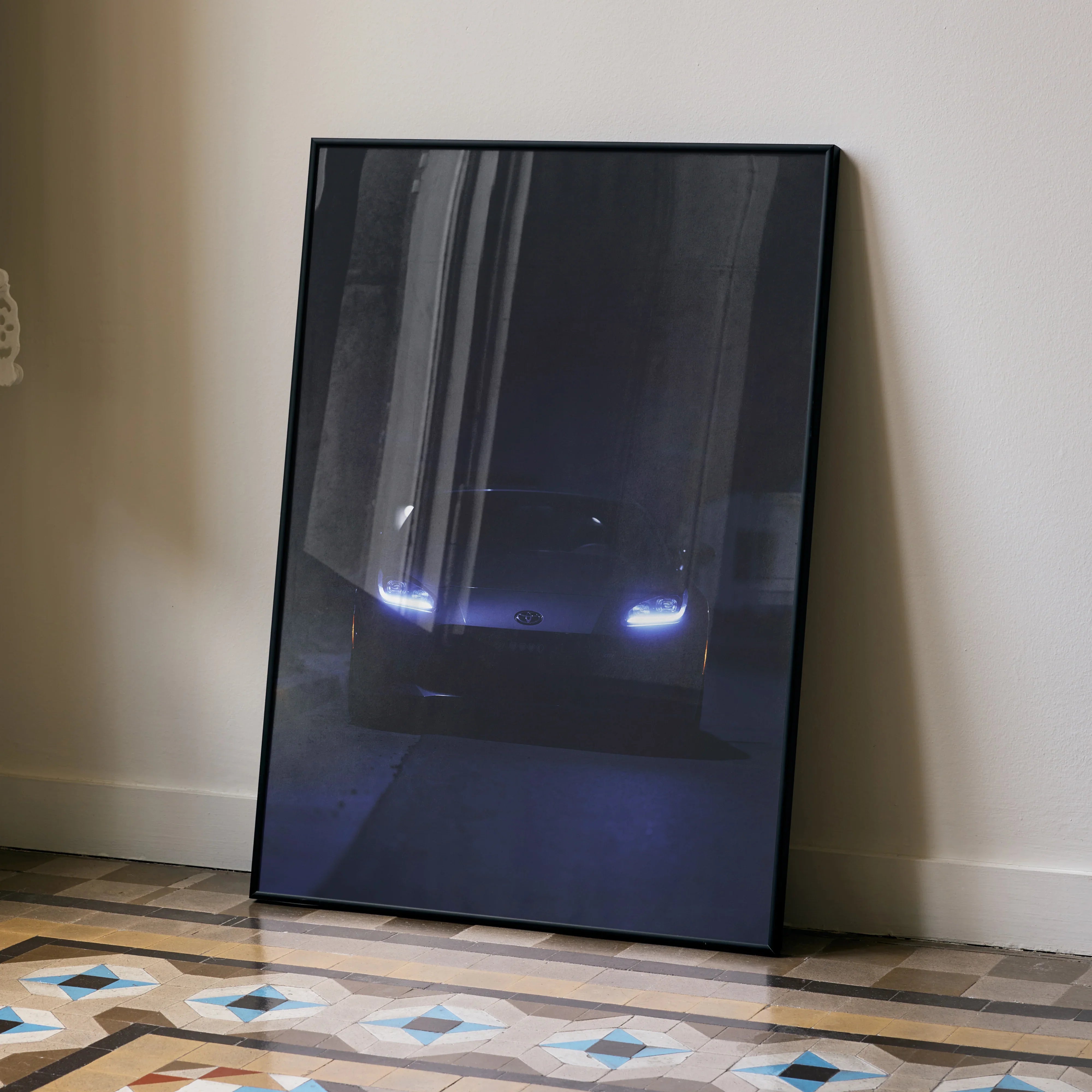 GR86 automotive art poster featuring car headlights glowing in the dark, framed wall art.