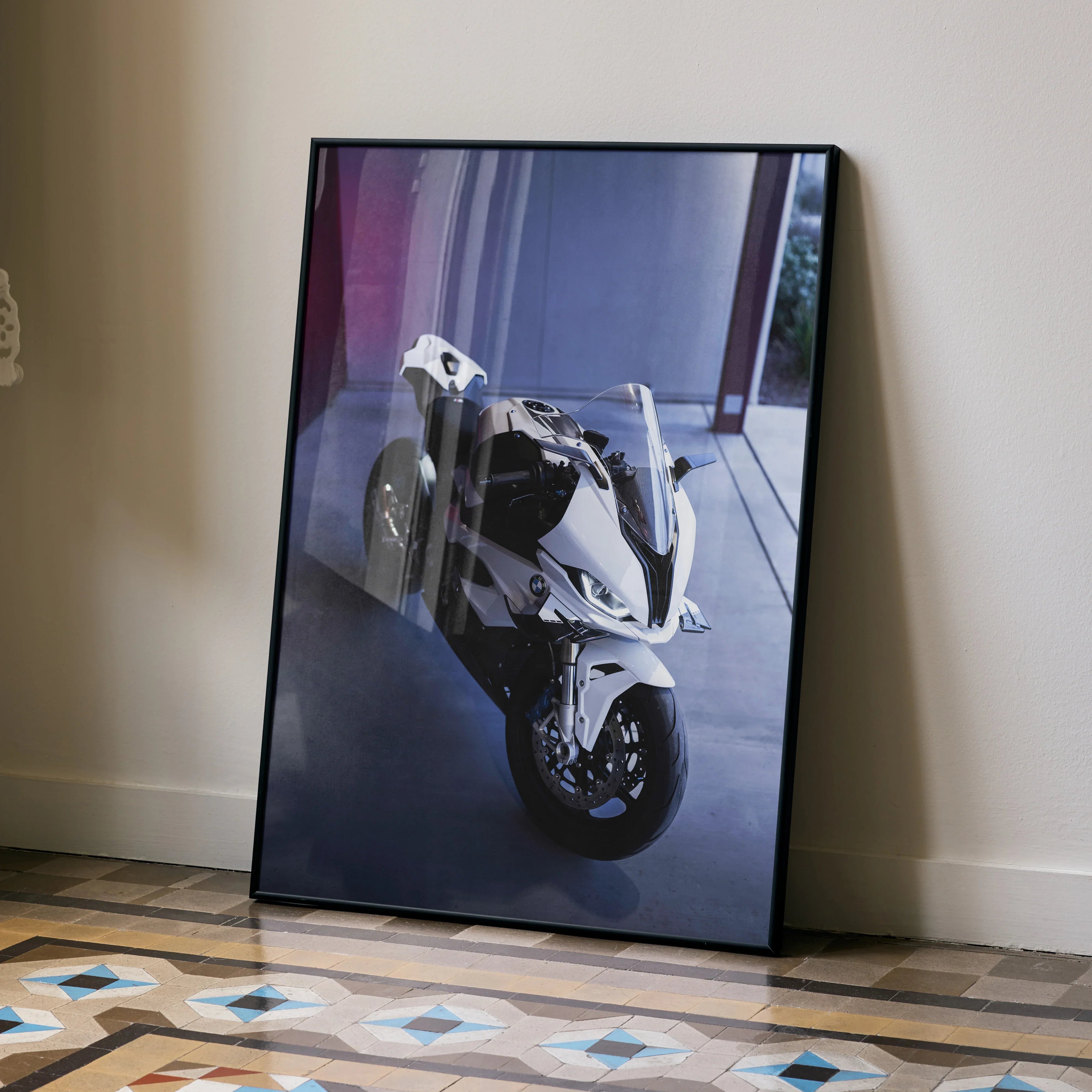 BMW S1000RR motorcycle art poster with dynamic frontal view, modern wall art in black frame.