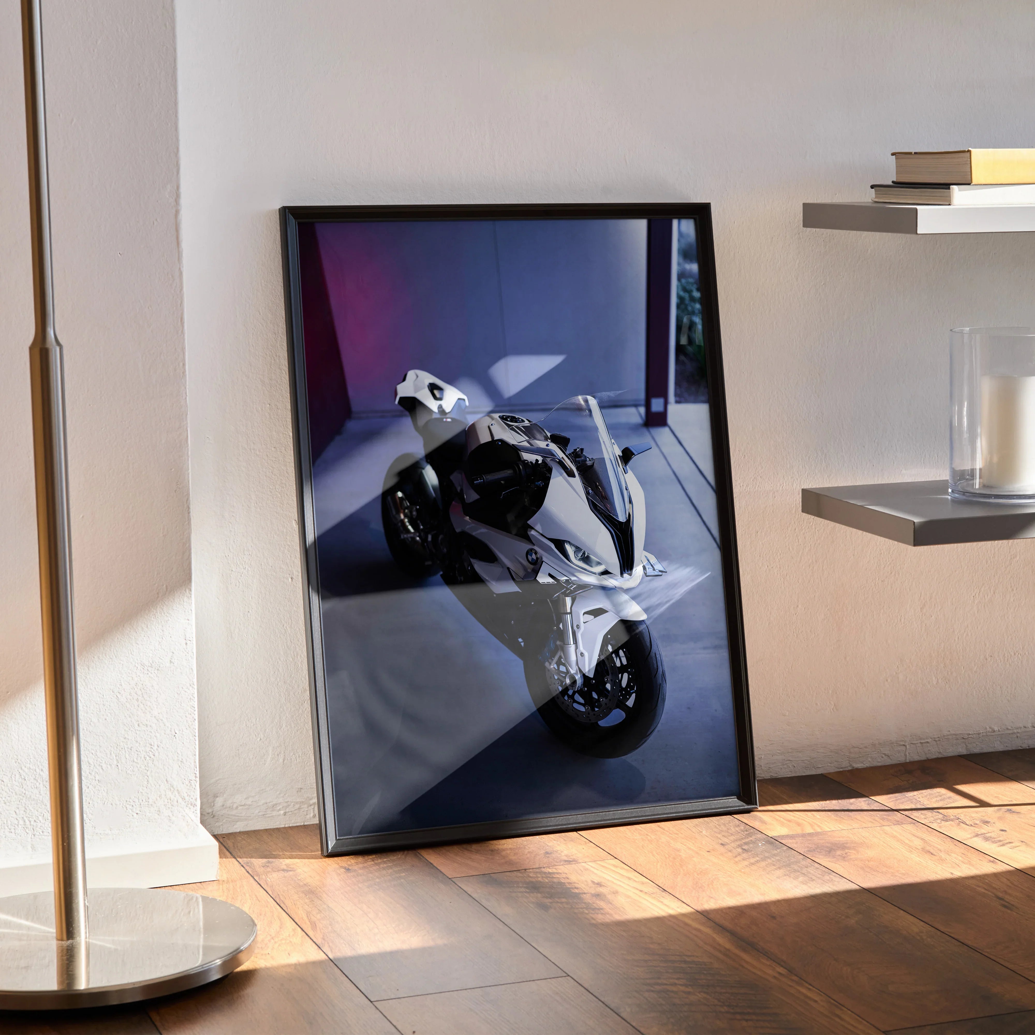 BMW S1000RR motorcycle poster with sleek black and white design leaning on wooden floor wall art.