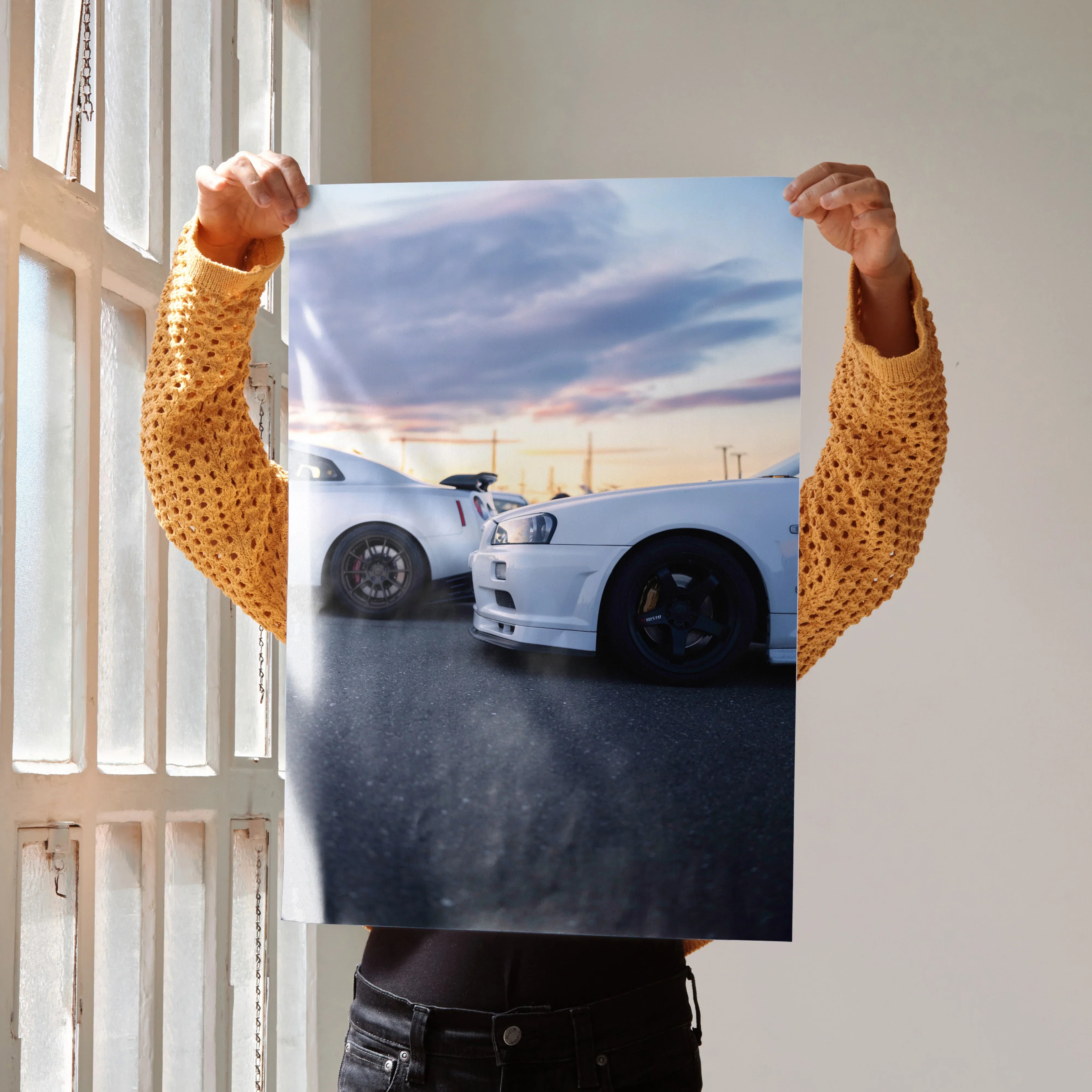 Nissan R34 GTR white sports car poster showing front side in dramatic sunset wall art.