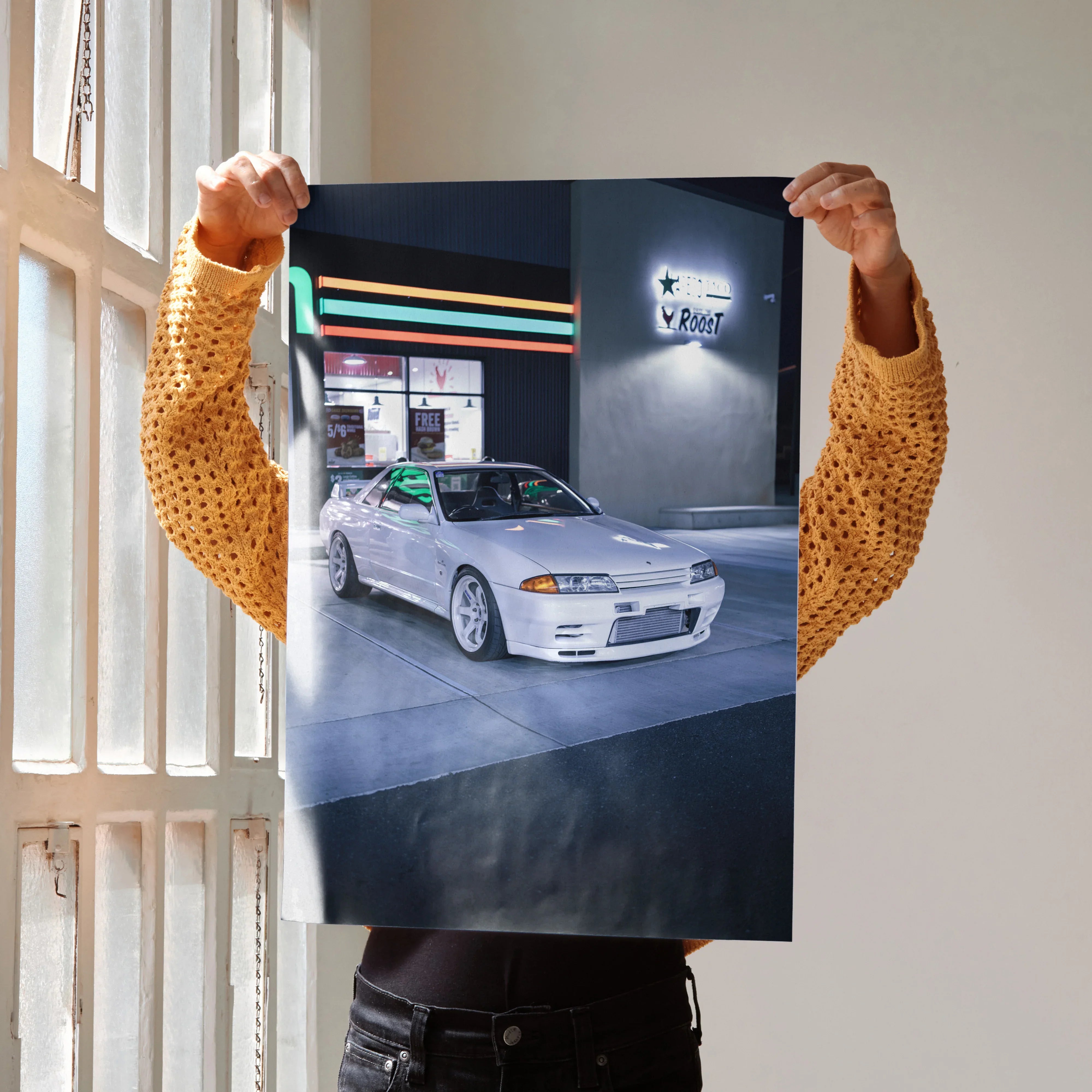 Nissan GTR R32 Skyline poster showing white car parked by retro gas station at night, wall art decor.