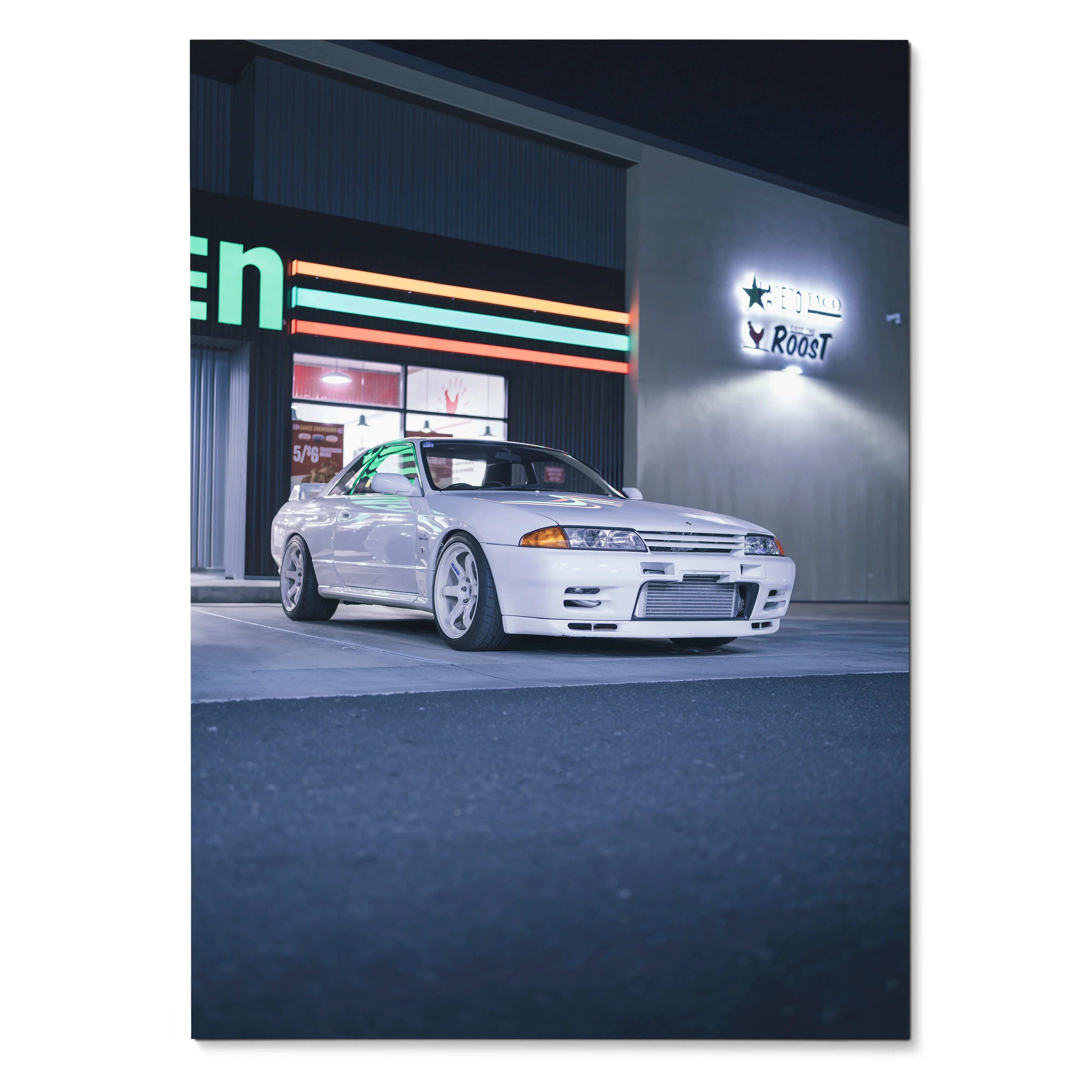 Nissan R32 GTR white sports car parked outside retro gas station poster wall art.