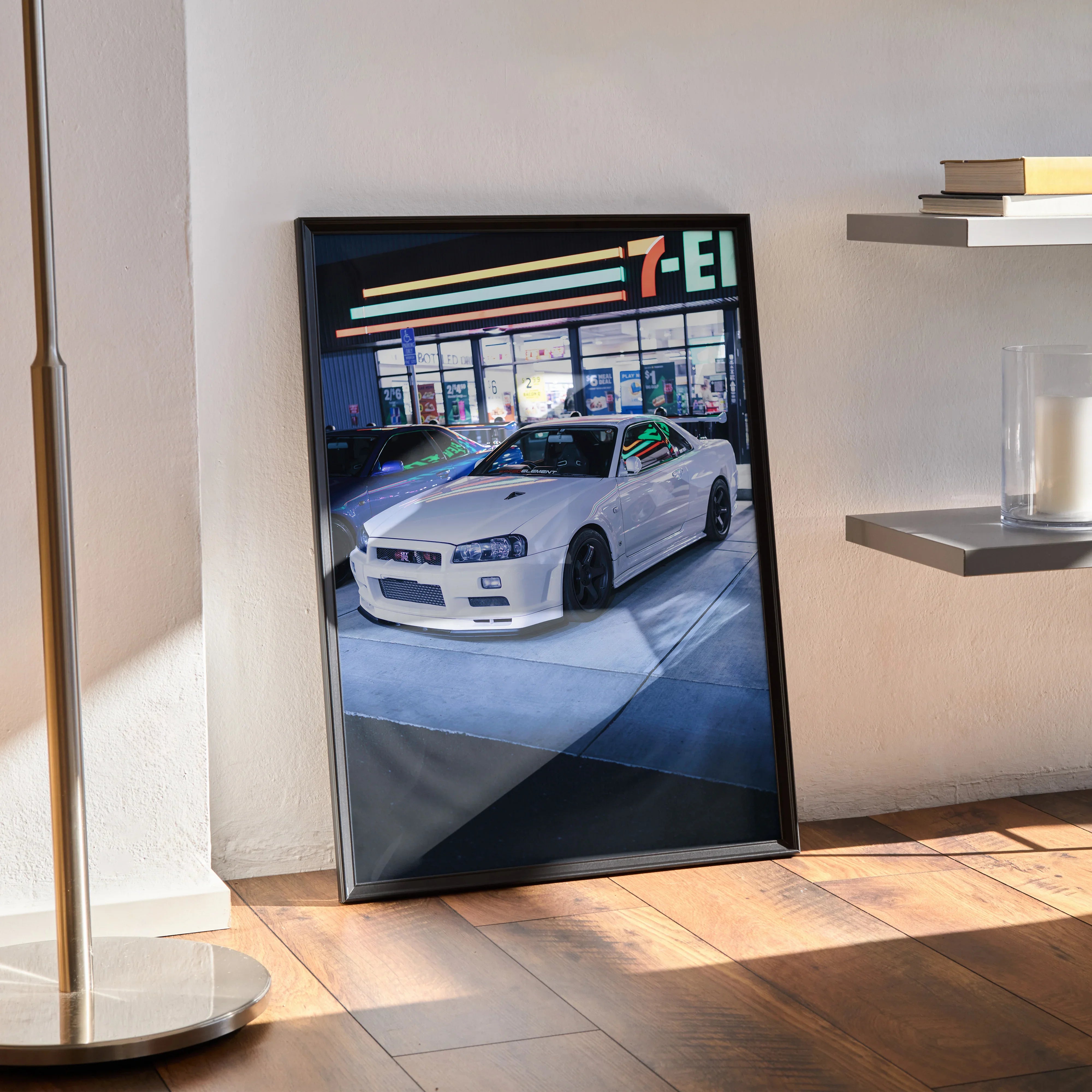 Nissan R34 GTR Skyline poster with high-resolution art, displayed as premium wall art in black frame.