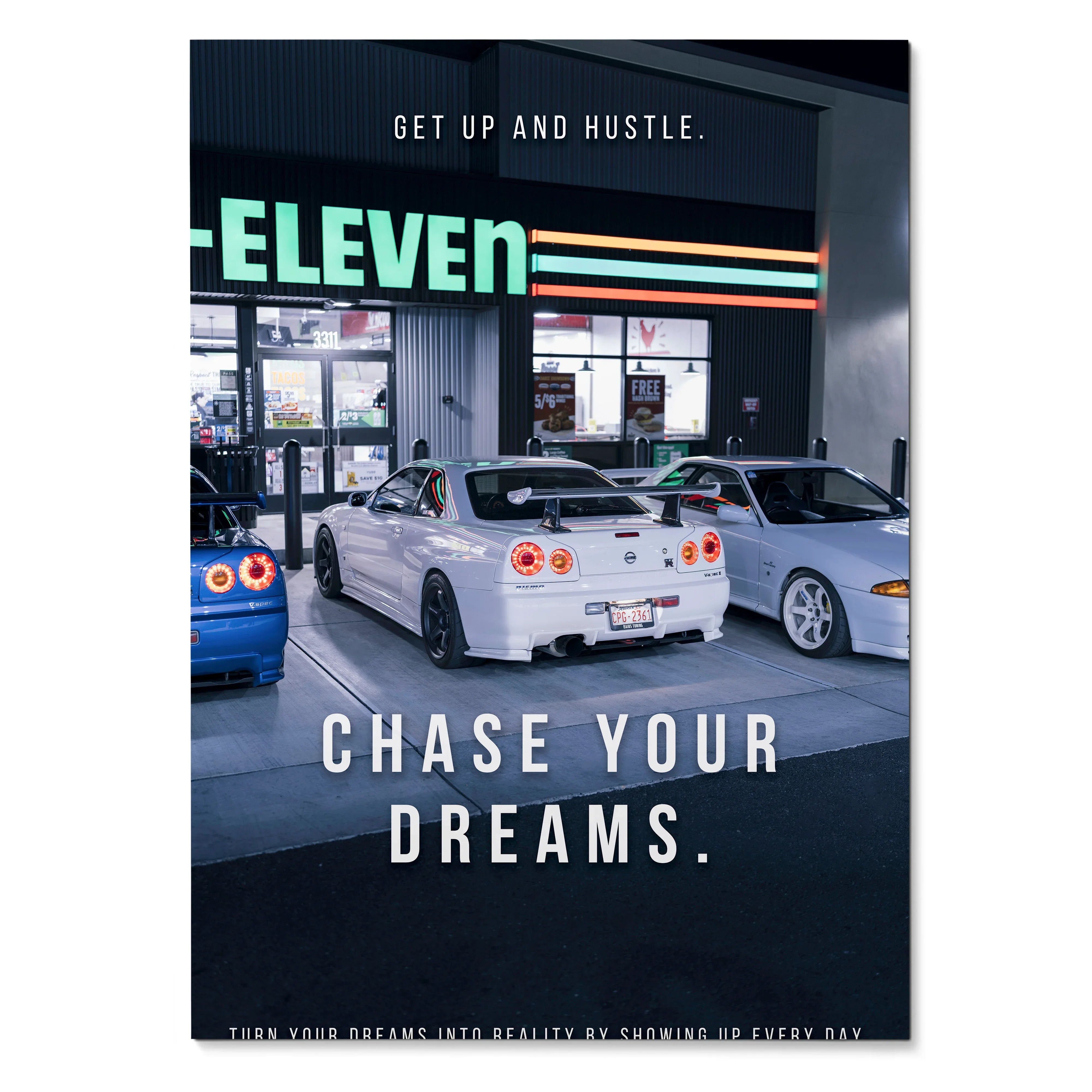 Motivational poster wall art featuring a white Nissan GT-R R34 Skyline under 7-Eleven signage with text "Get up and hustle.