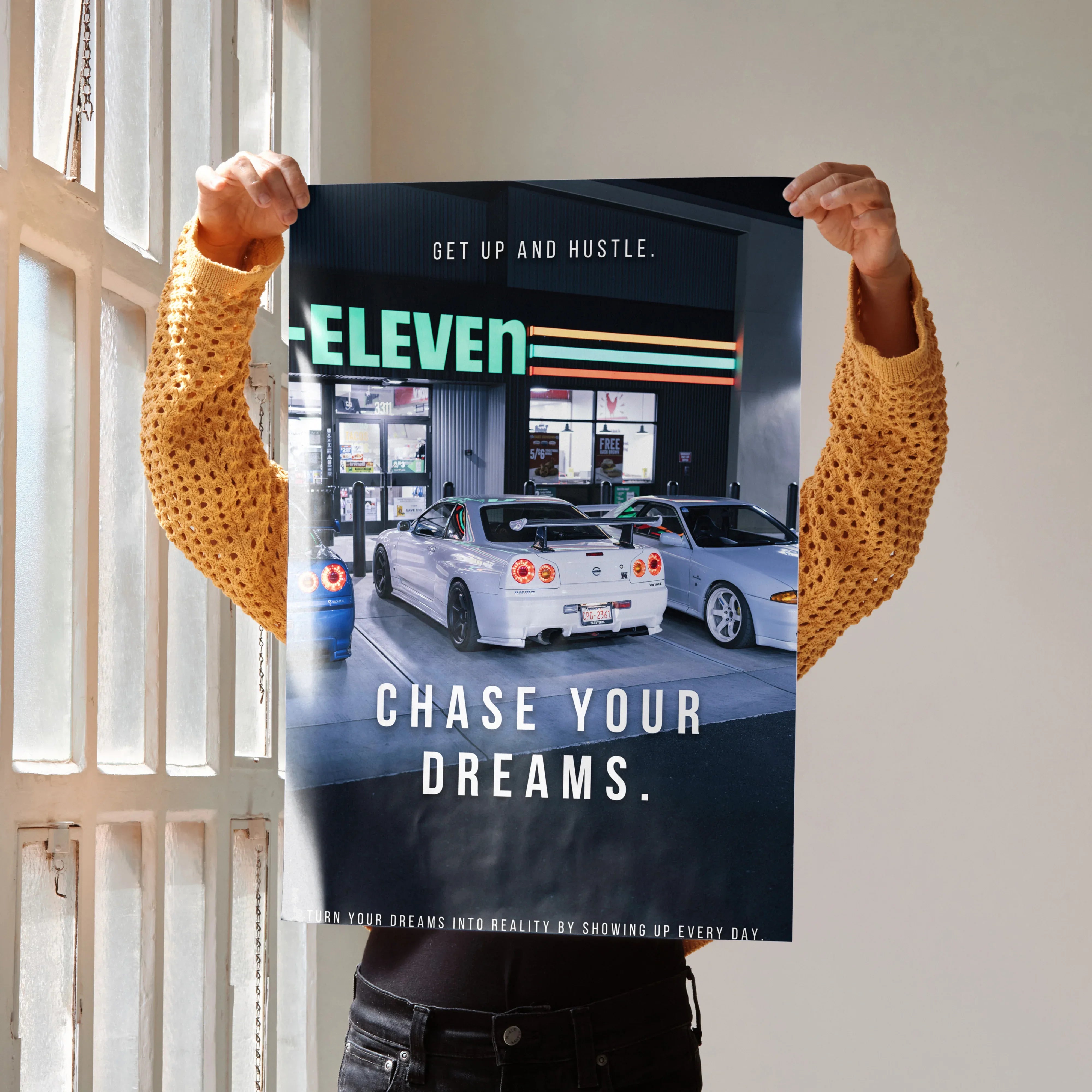 Motivational Nissan GT-R R34 Skyline poster with "Chase Your Dreams" text, wall art design.