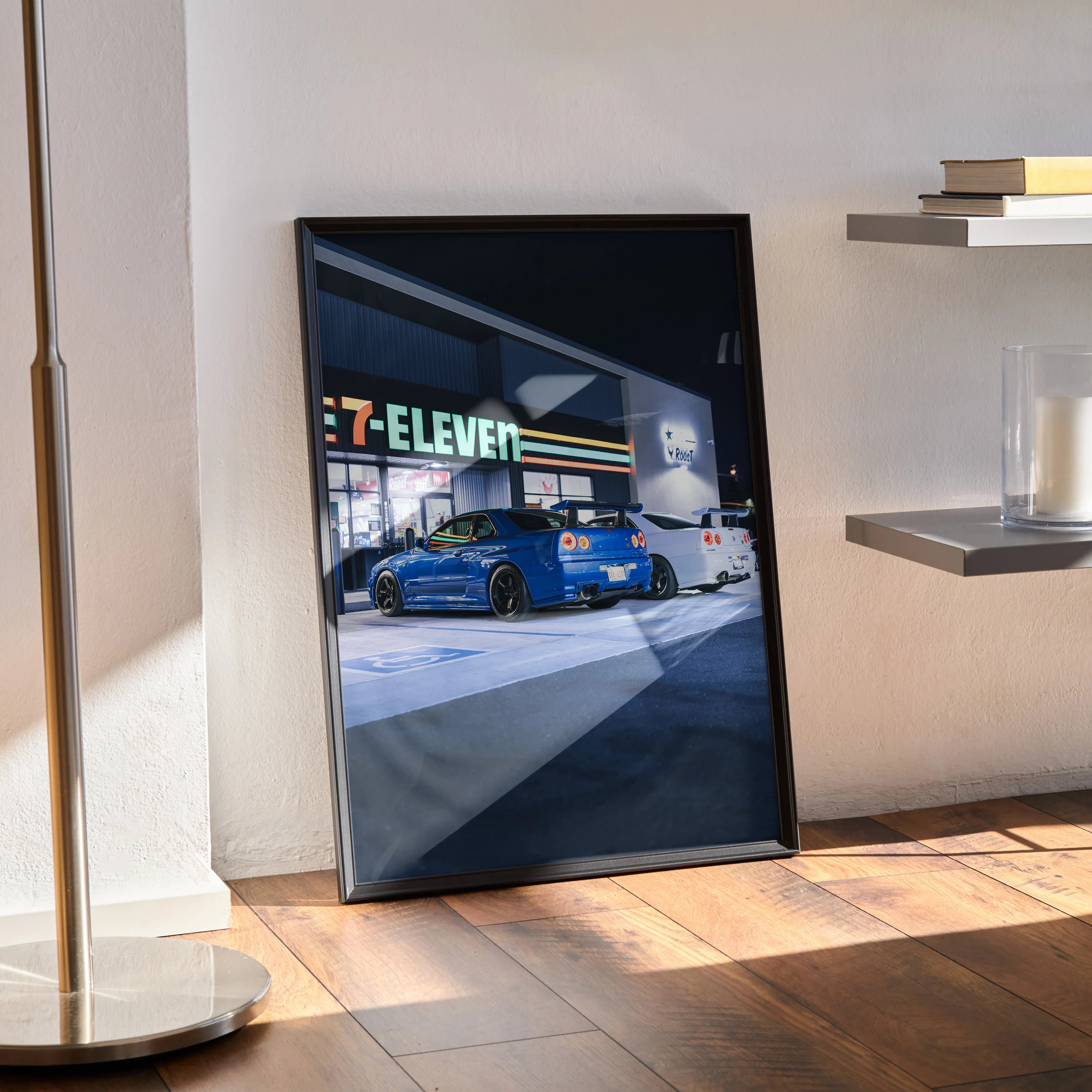 Nissan GTR R34 Skyline blue car poster with nighttime urban scene wall art in black frame.