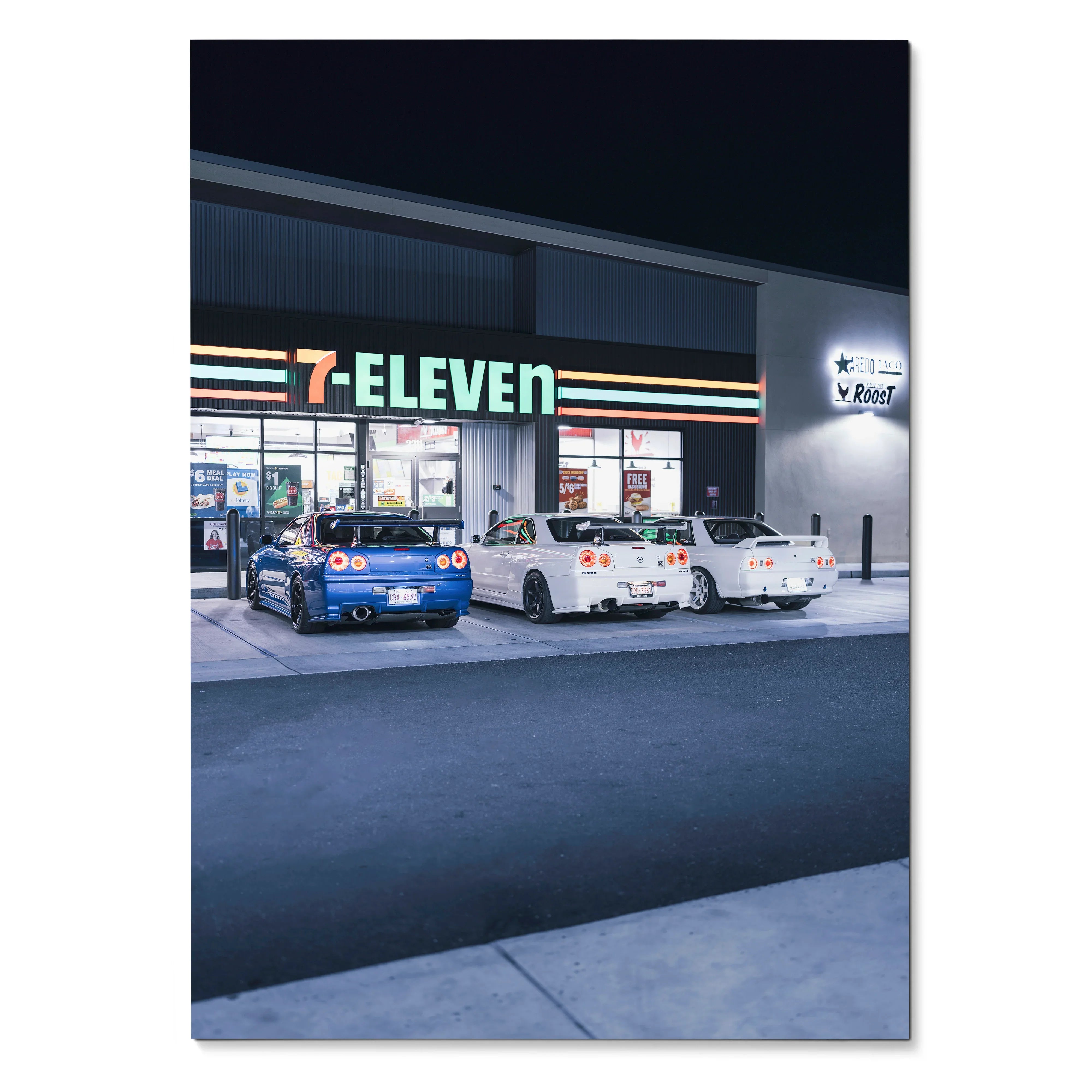 Nissan GTR R32 and R34 Skyline poster featuring three cars parked outside 7-Eleven at night wall art.