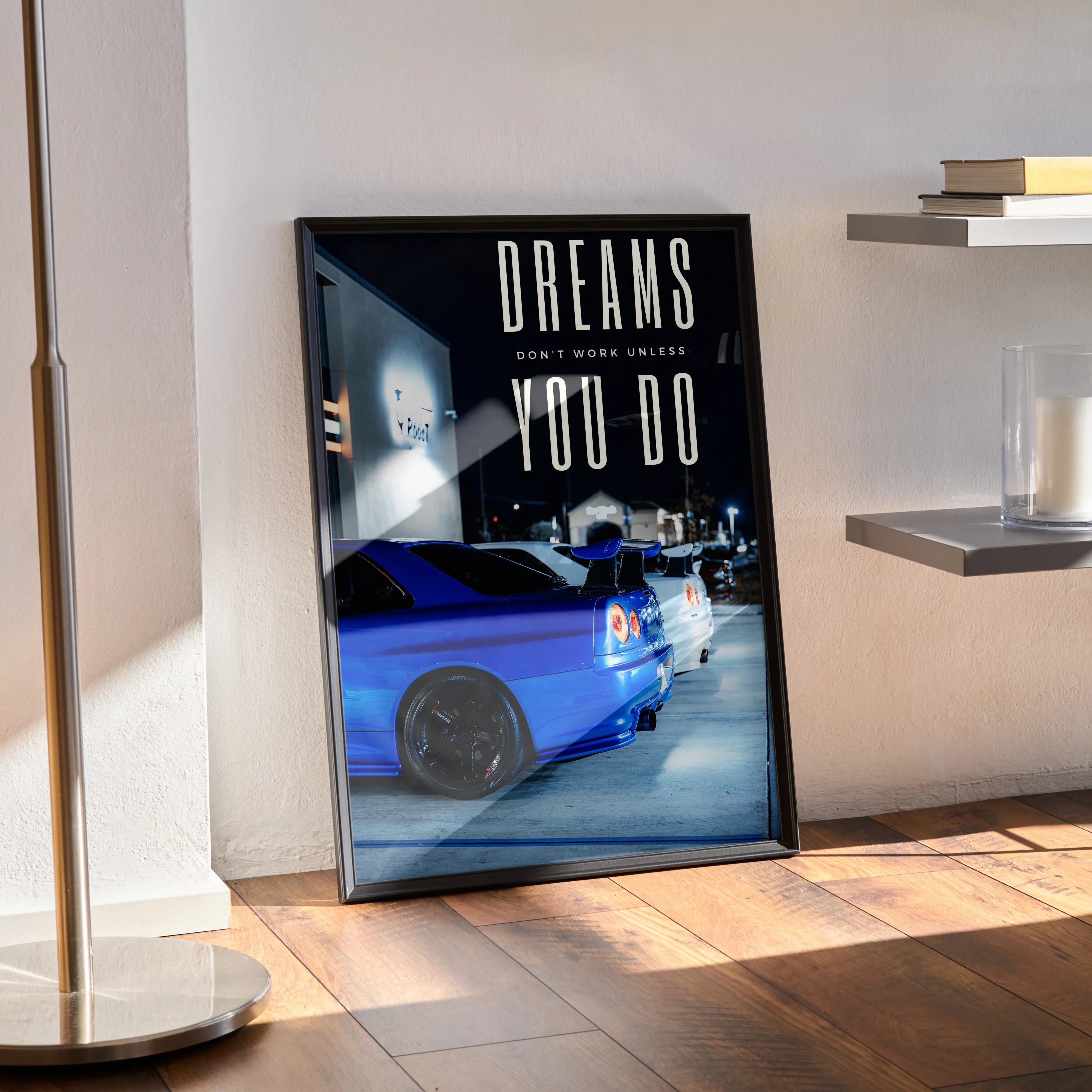 Nissan GT-R R34 Skyline poster with motivational text "Dreams don't work unless you do" framed wall art.