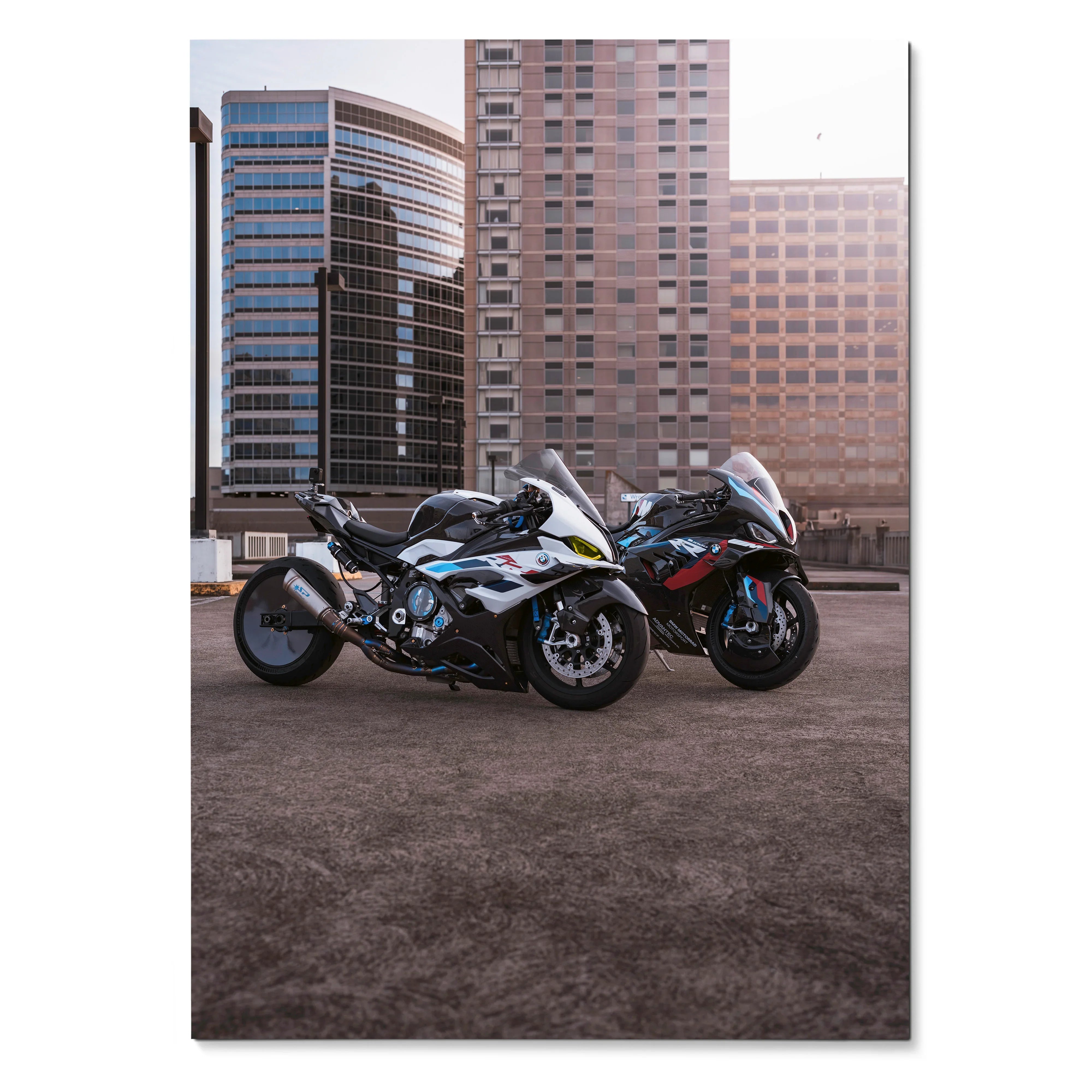 BMW M1000RR and S1000RR drag spec motorcycles against cityscape poster wall art.
