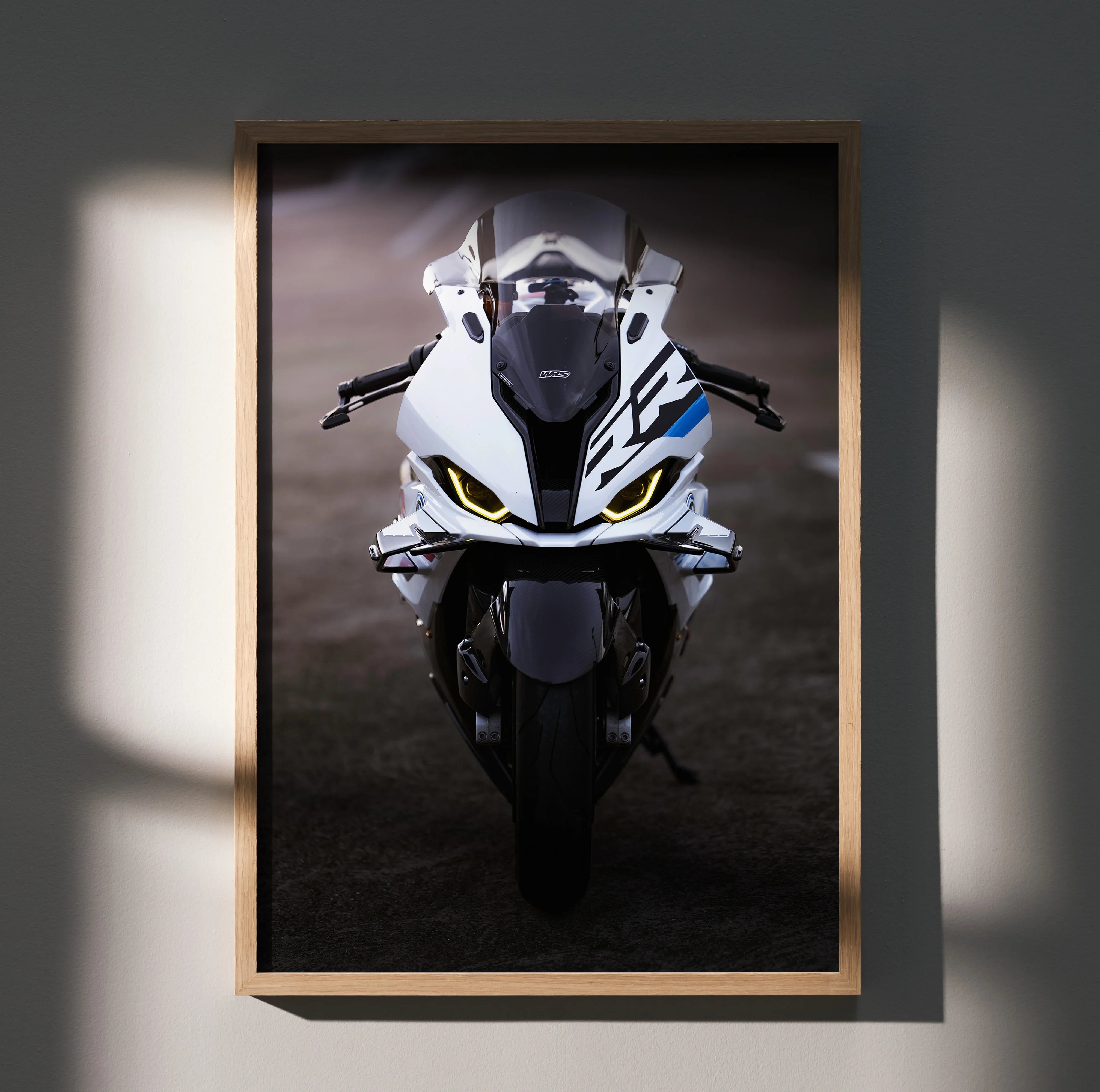 BMW S1000RR Drag Spec motorcycle poster with sharp white and black design, yellow headlight accents wall art.