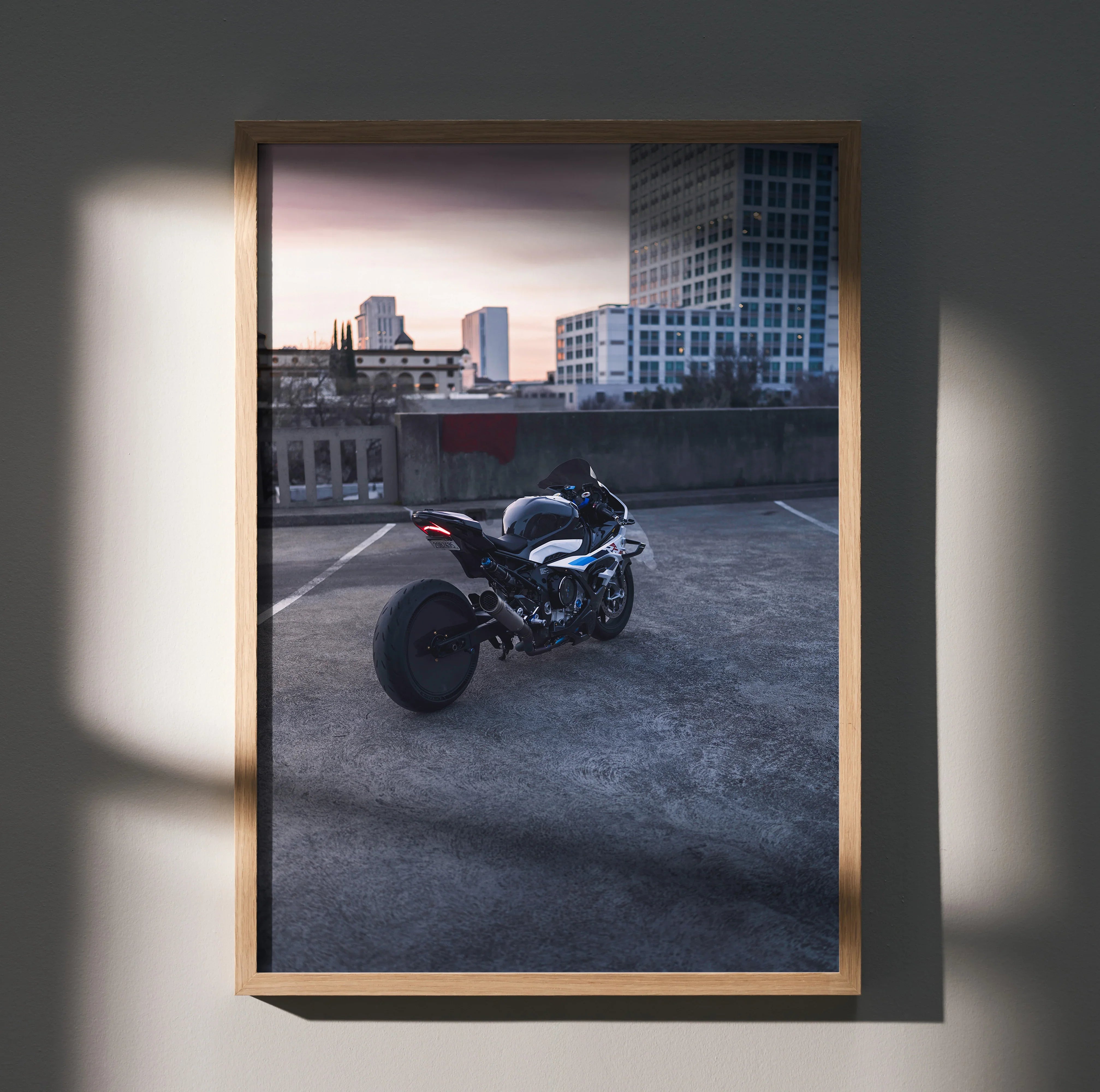 S1000RR Drag Spec motorcycle poster with urban rooftop backdrop, modern wall art in wooden frame.