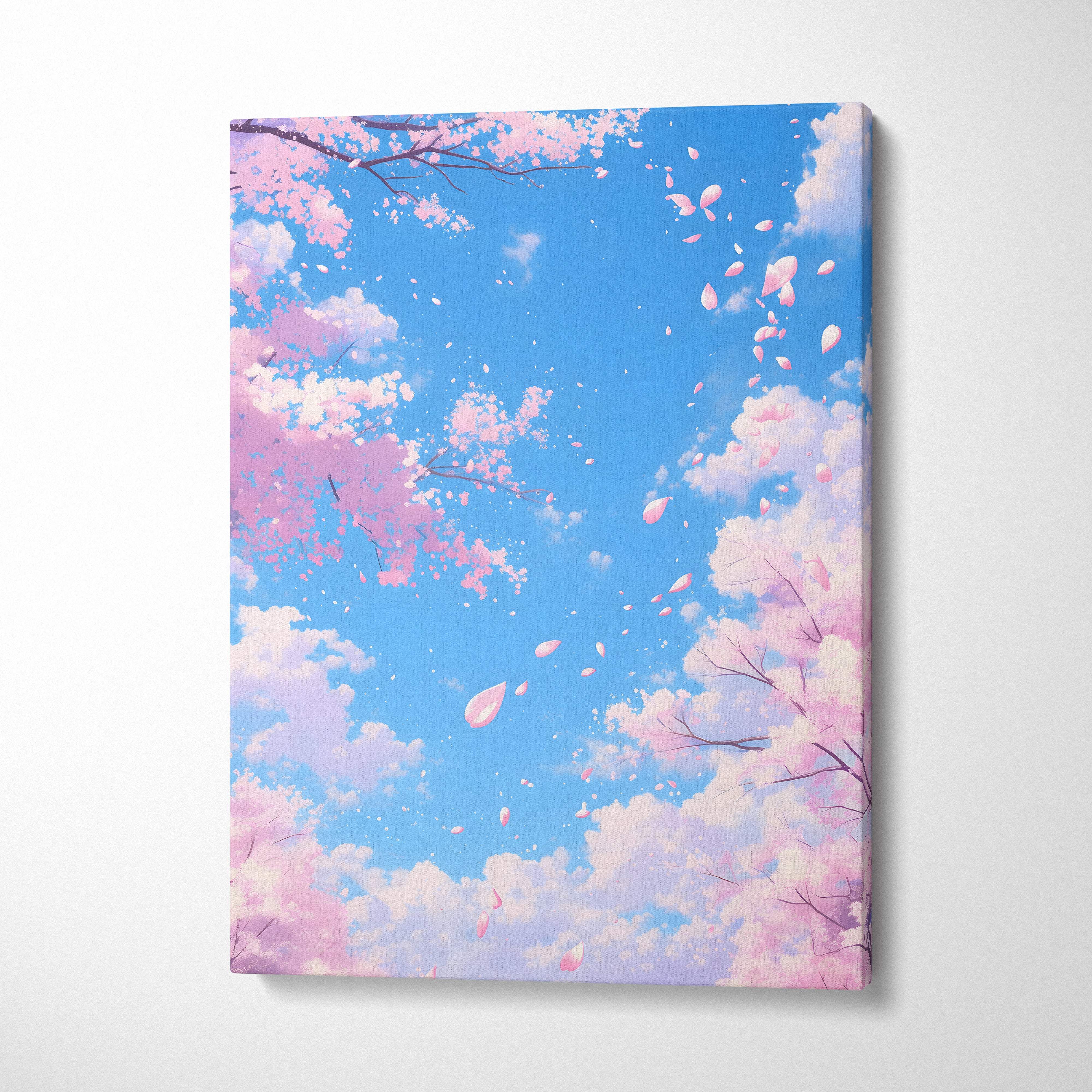 A rectangular canvas print of pink cherry blossoms falling against a vibrant blue sky with fluffy white clouds
