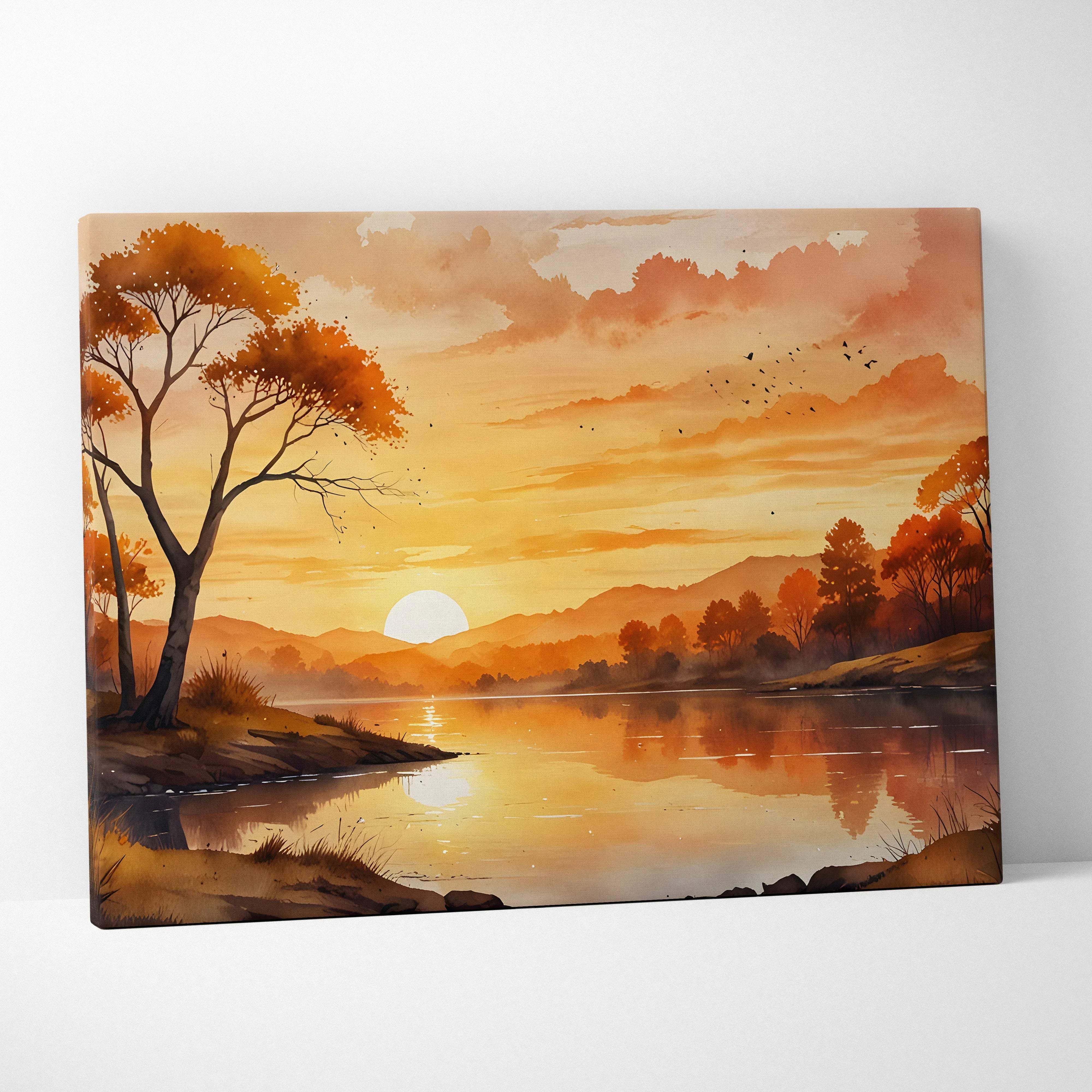 Watercolor sunset landscape canvas wall art with warm golden-orange hues reflecting on a calm lake with silhouetted trees