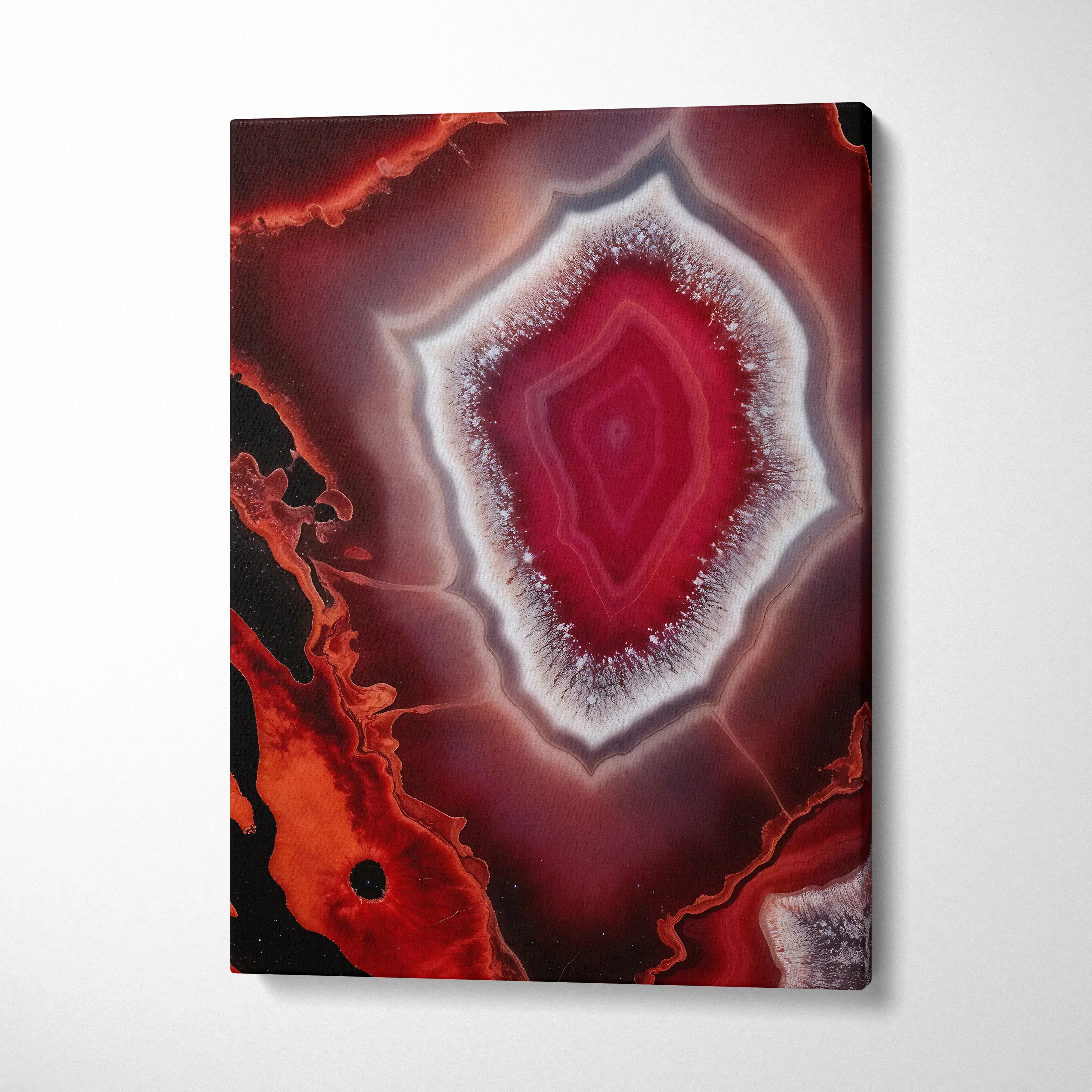 Abstract red and black geode design on canvas wall art with vibrant modern patterns.