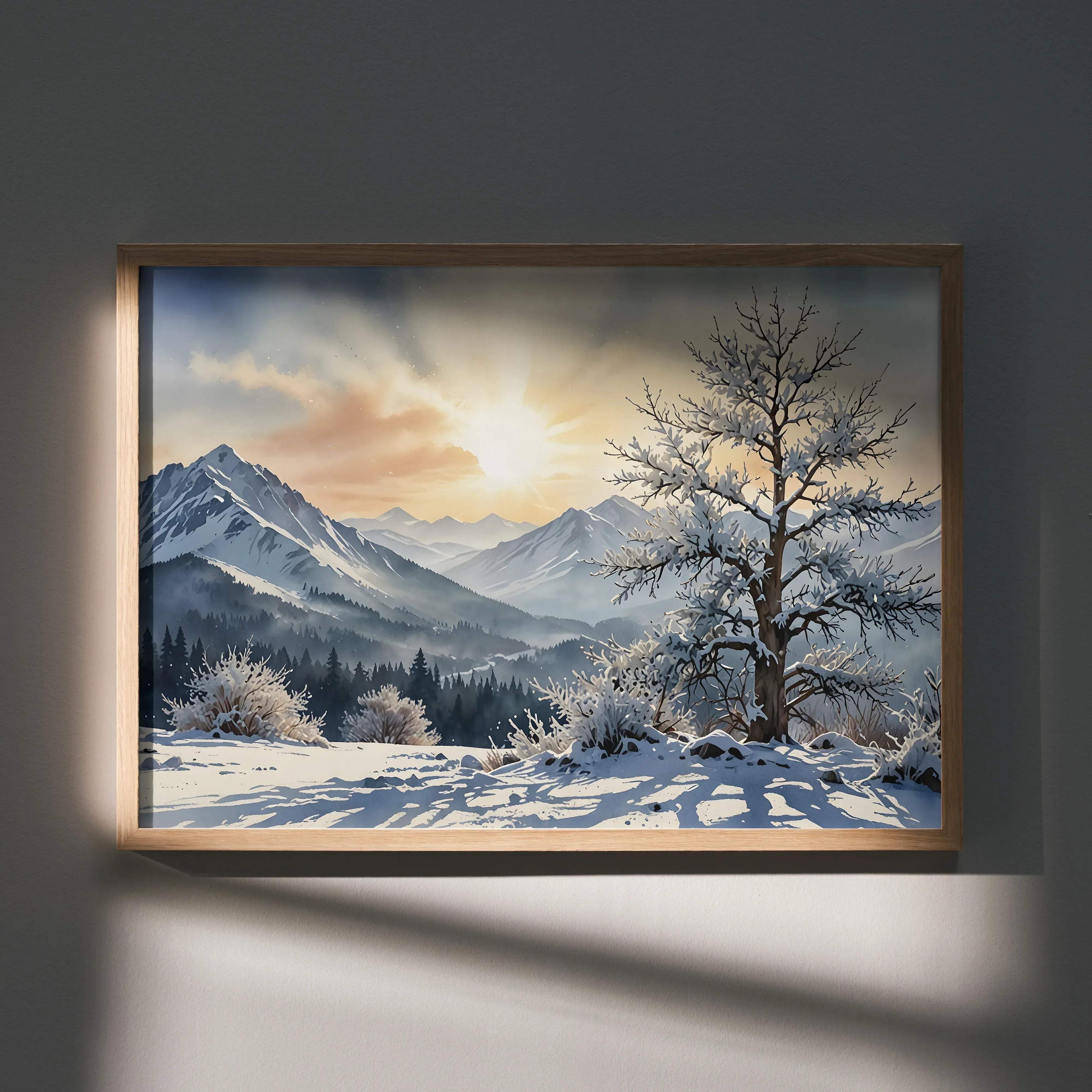 A framed watercolor styled sunset over snowy landscape poster with snow-covered mountains and a bare frosty tree