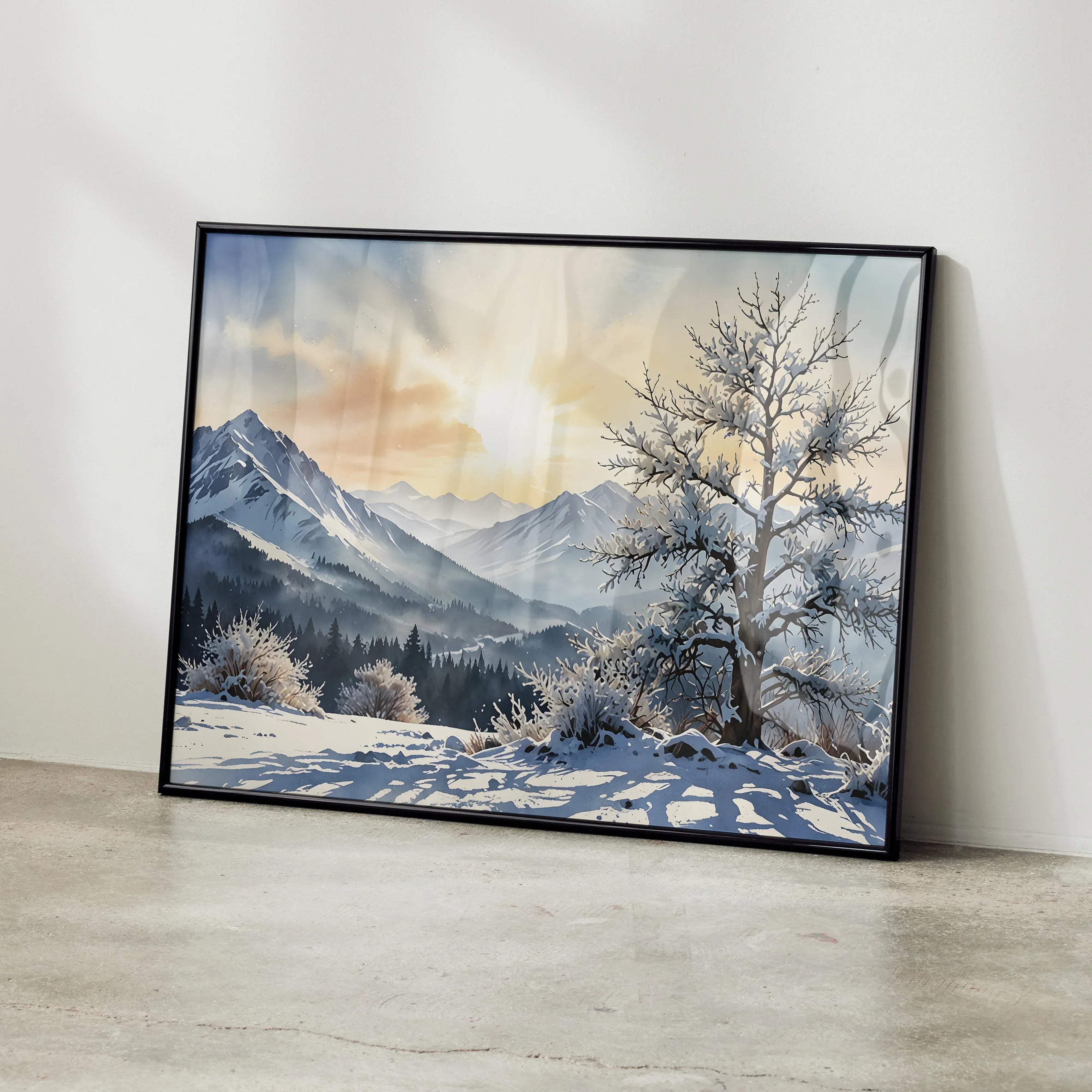 Black-framed watercolor styled sunset over snowy landscape poster featuring snow-capped mountains and frosted tree branches