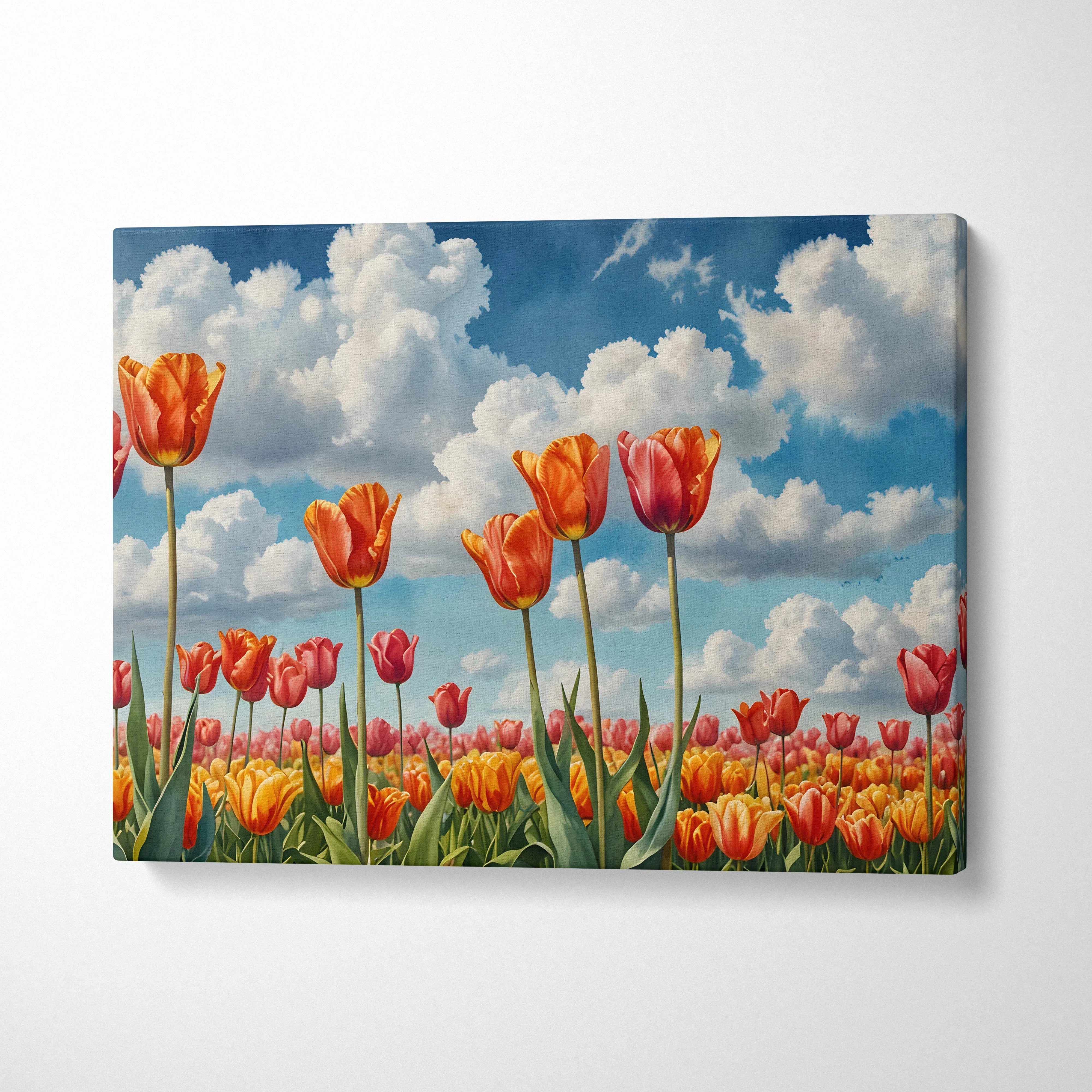 Canvas wall art featuring vibrant orange and red tulips under a bright blue sky with fluffy white clouds.