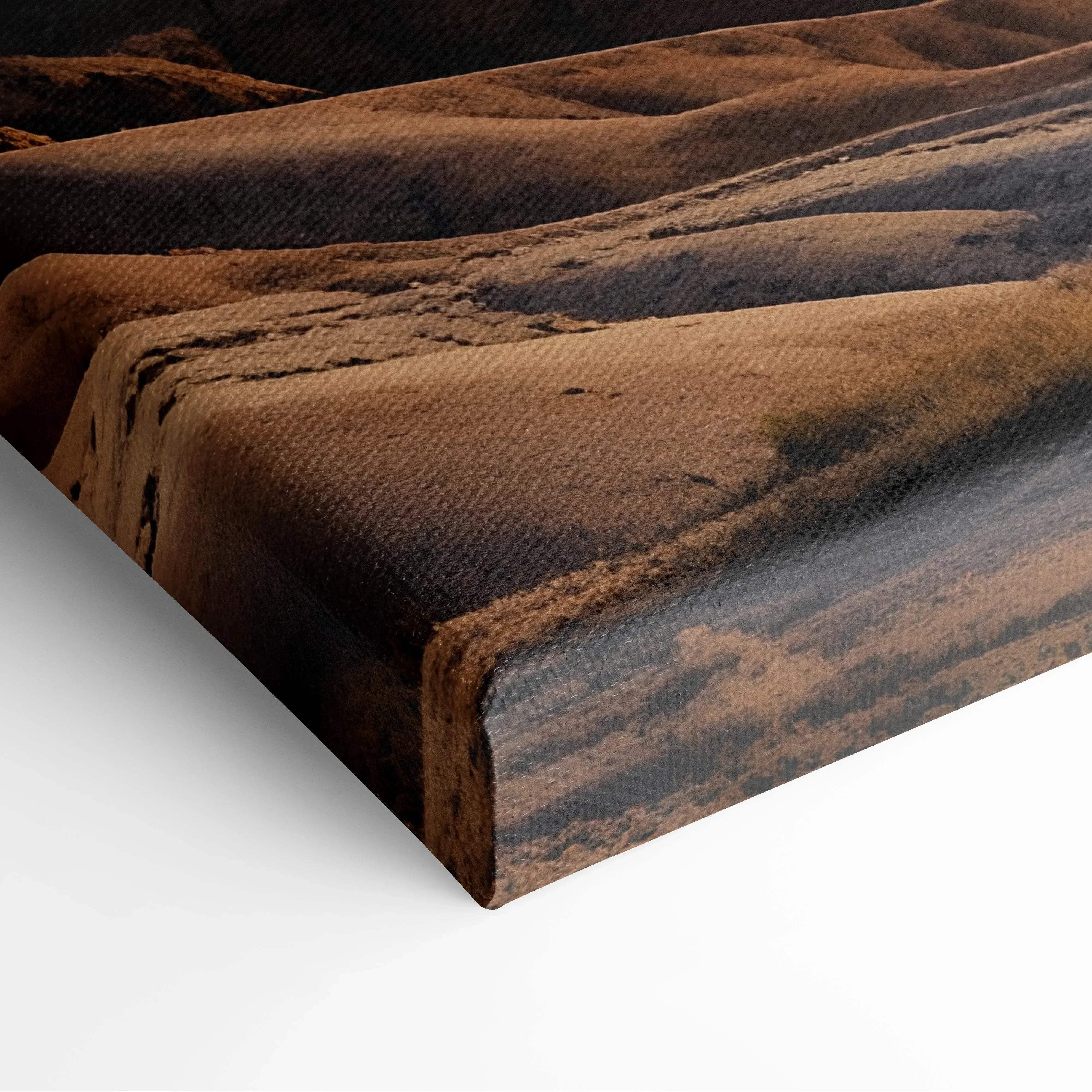 Golden hour landscape canvas wall art featuring textured earthy browns and blacks of mountain sunset over badlands