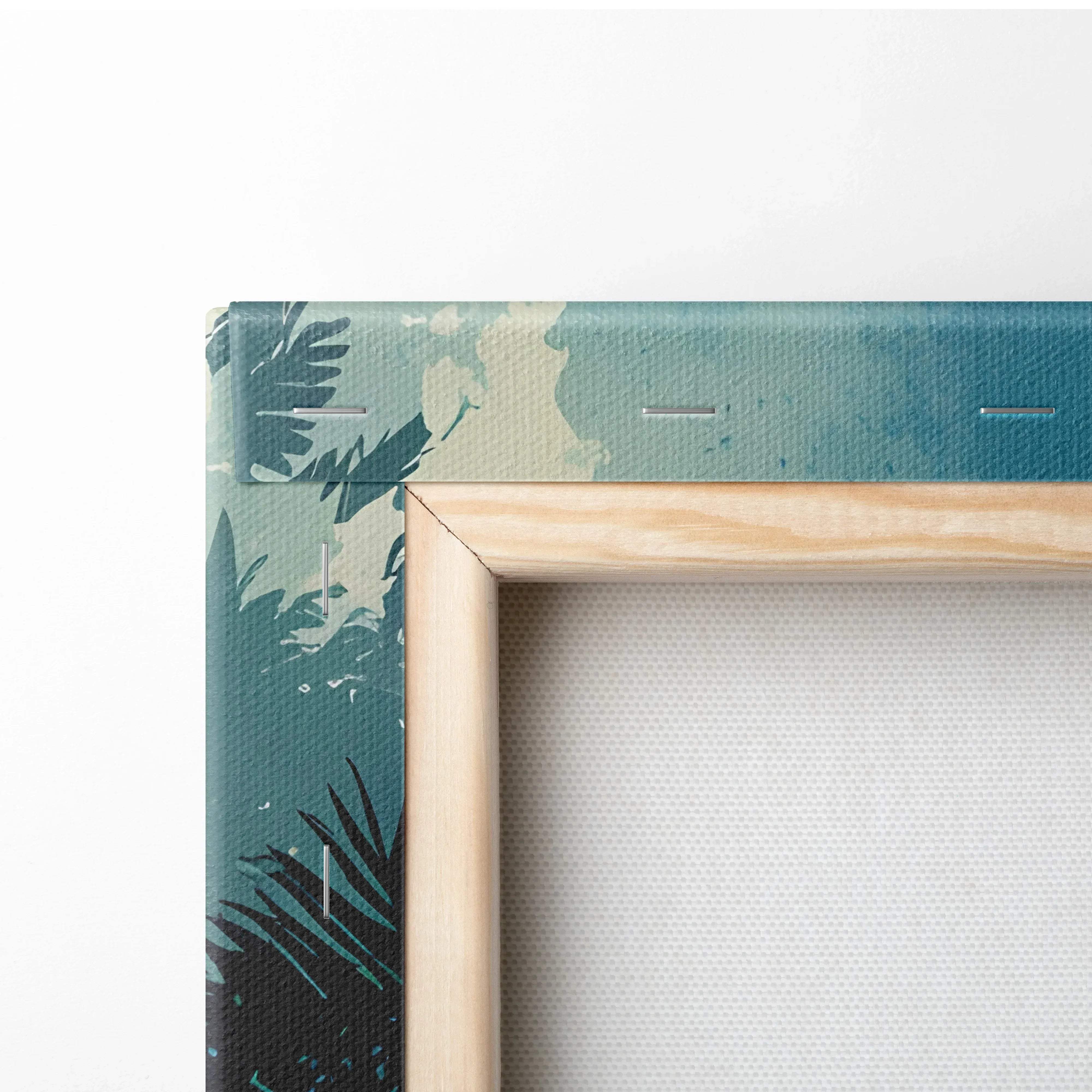Tropical jungle silhouette canvas wall art featuring teal and black tropical leaf pattern framed in light wood