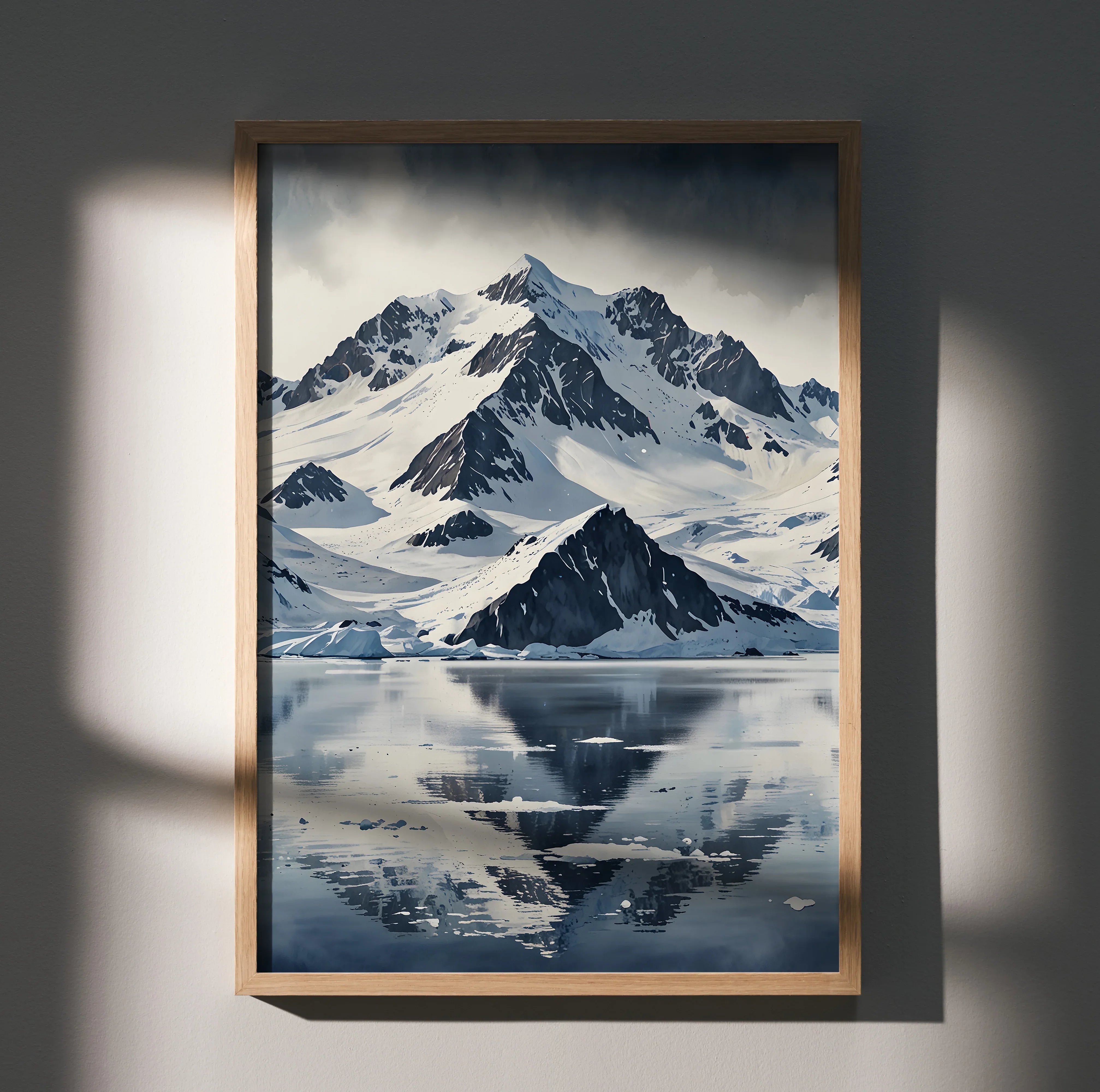 Watercolor style snow-covered mountain nature wall art poster with reflective lake and dark wooden frame.