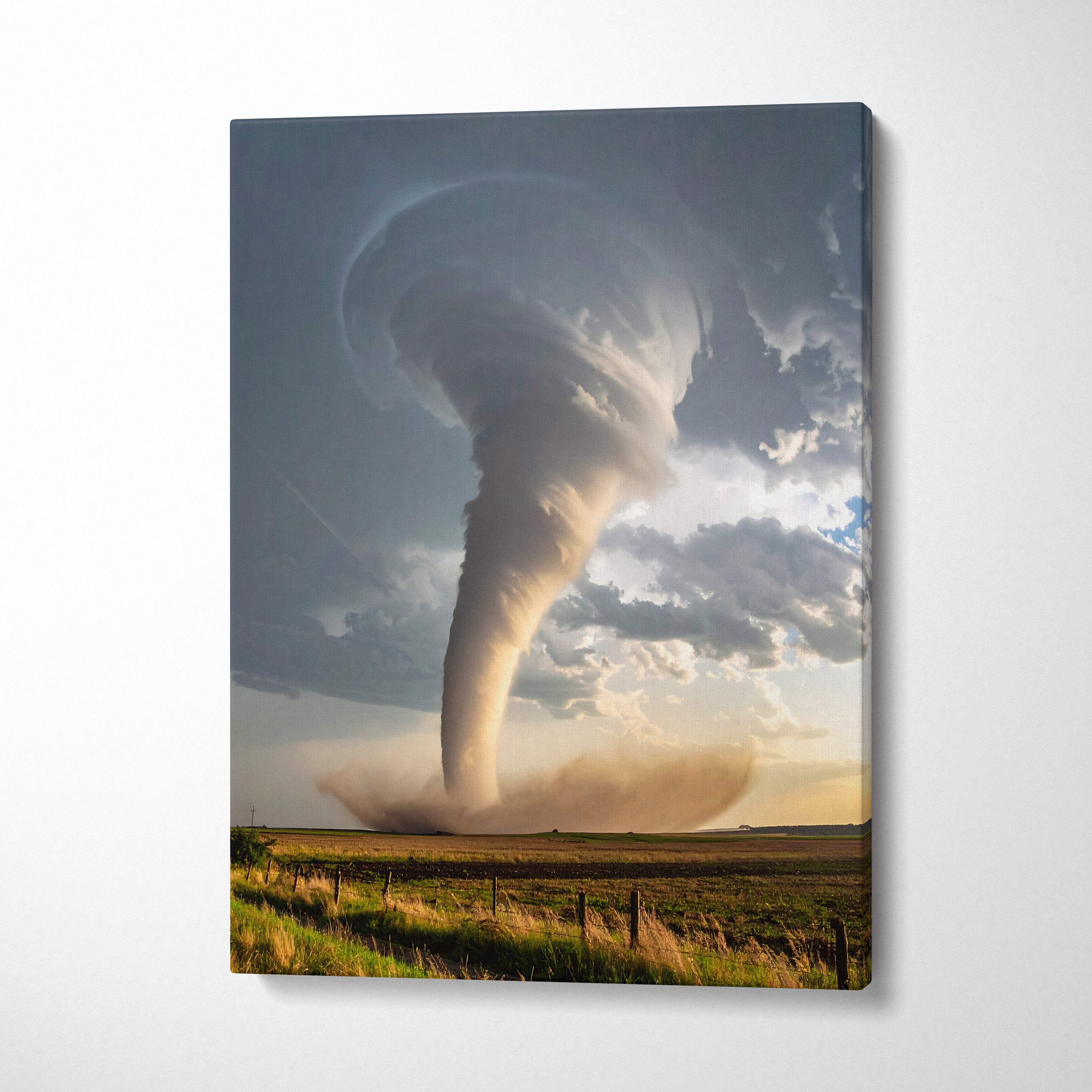 Canvas print of a massive supercell tornado with dark gray and white clouds on a golden horizon for wall decor