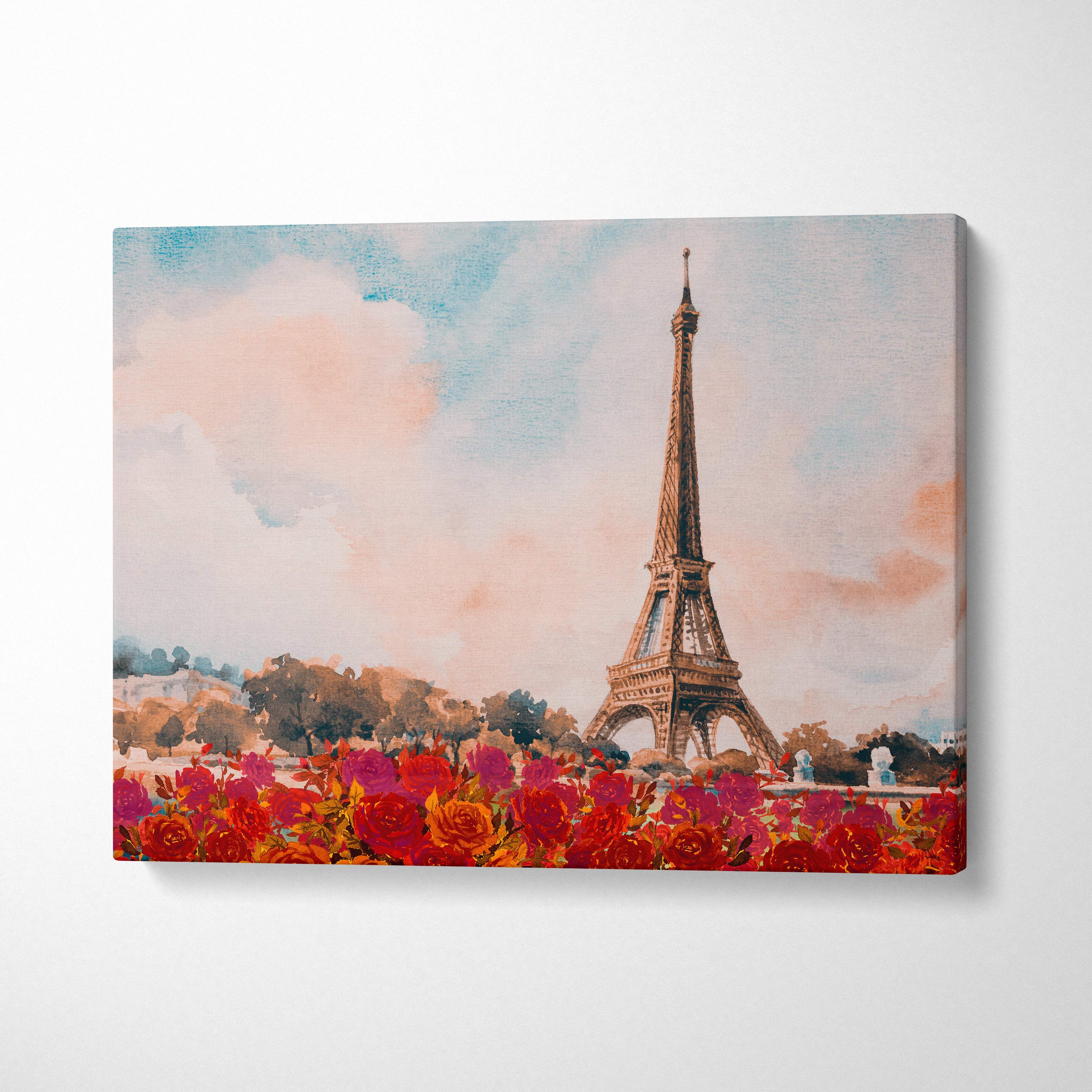 Watercolor canvas print of the eiffel tower with vibrant red and pink roses for chic french bedroom decor