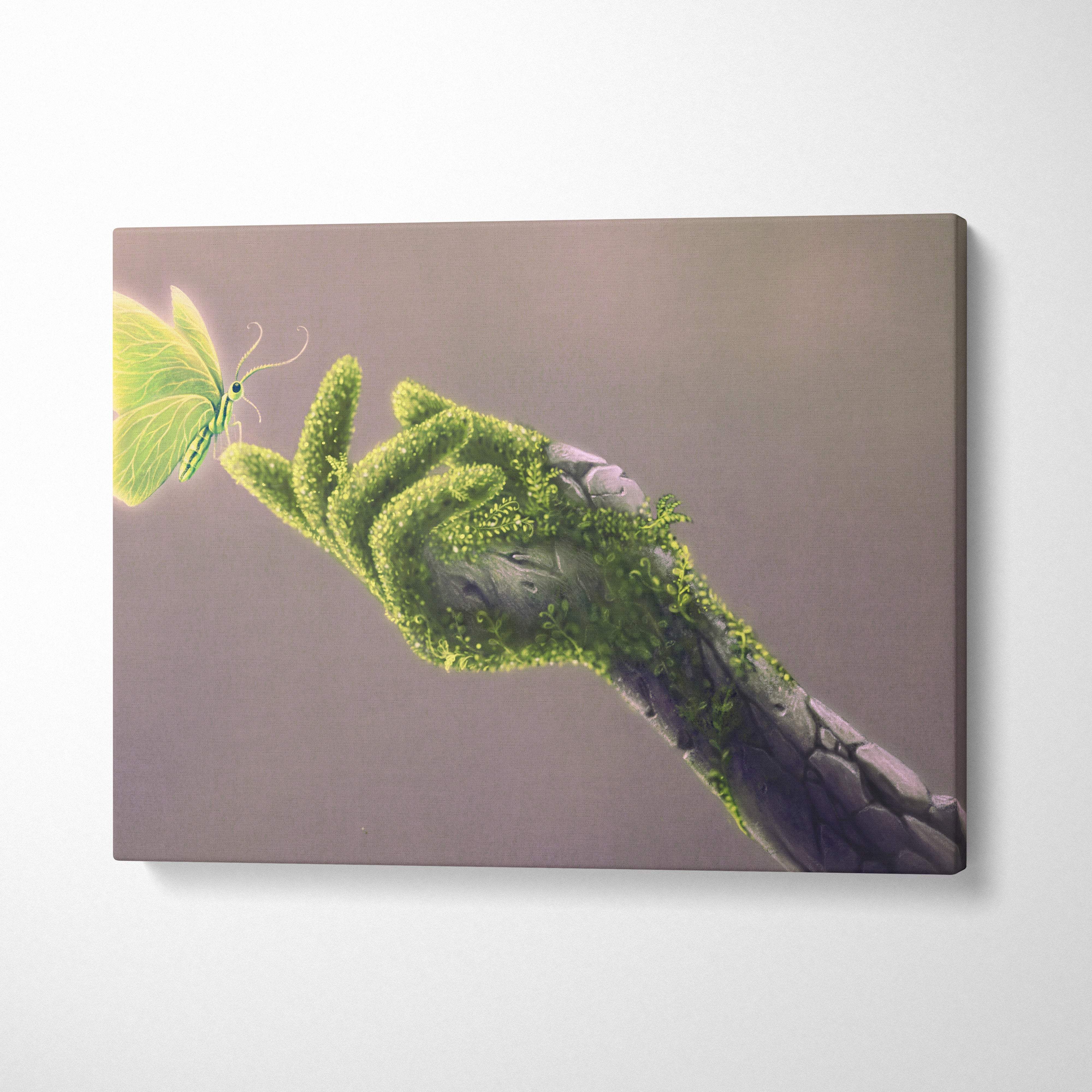 Contemporary green butterfly canvas wall art featuring a moss-covered hand reaching a glowing yellow butterfly