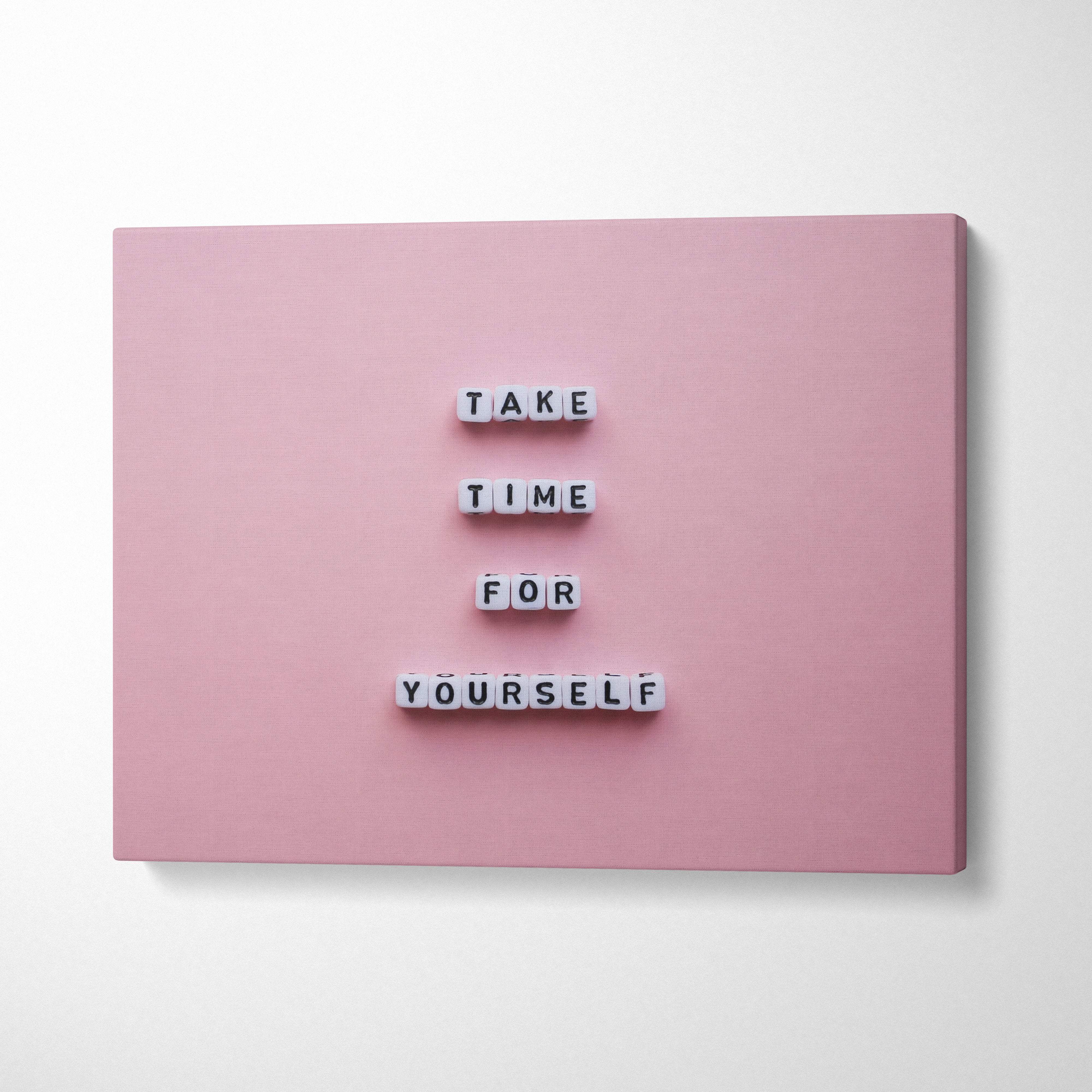 Pink canvas letter board with white cube letters displaying take time for yourself motivational quote wall art