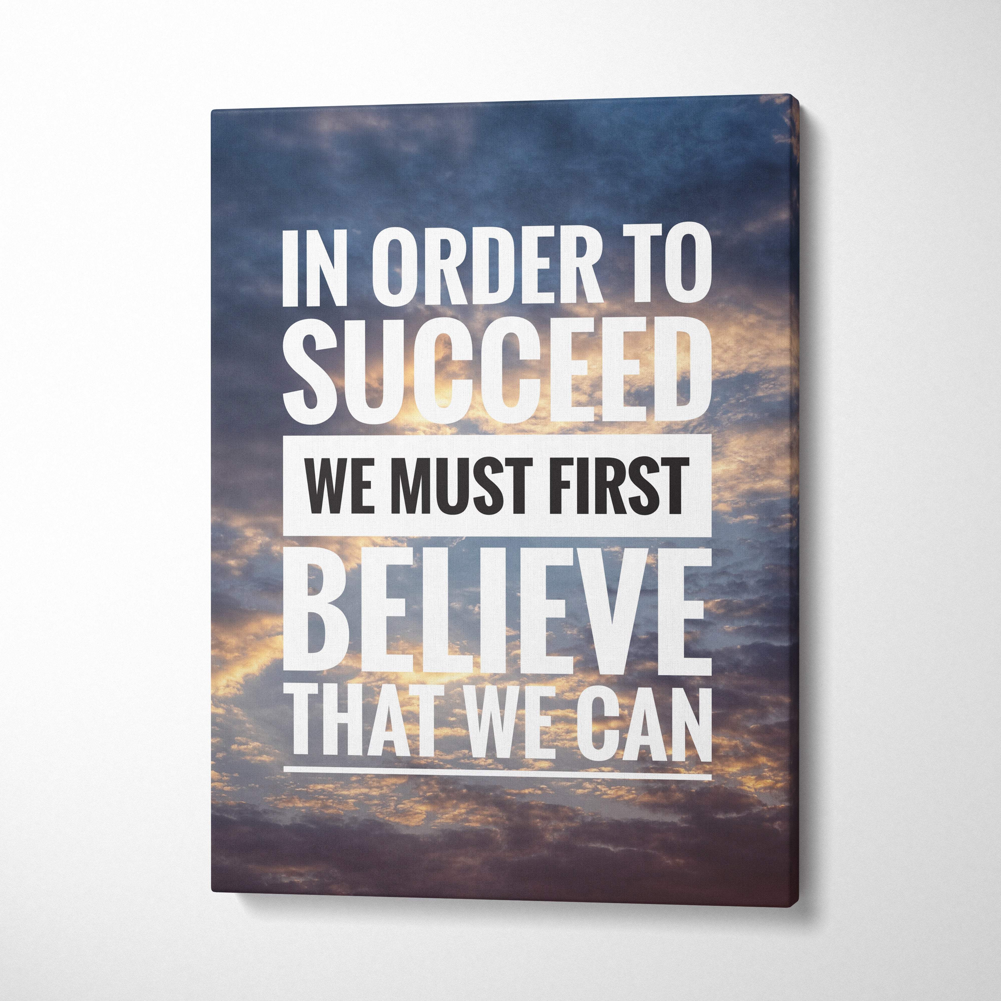 Canvas print featuring bold white and black motivational quote on dramatic sky backdrop for office or home decor