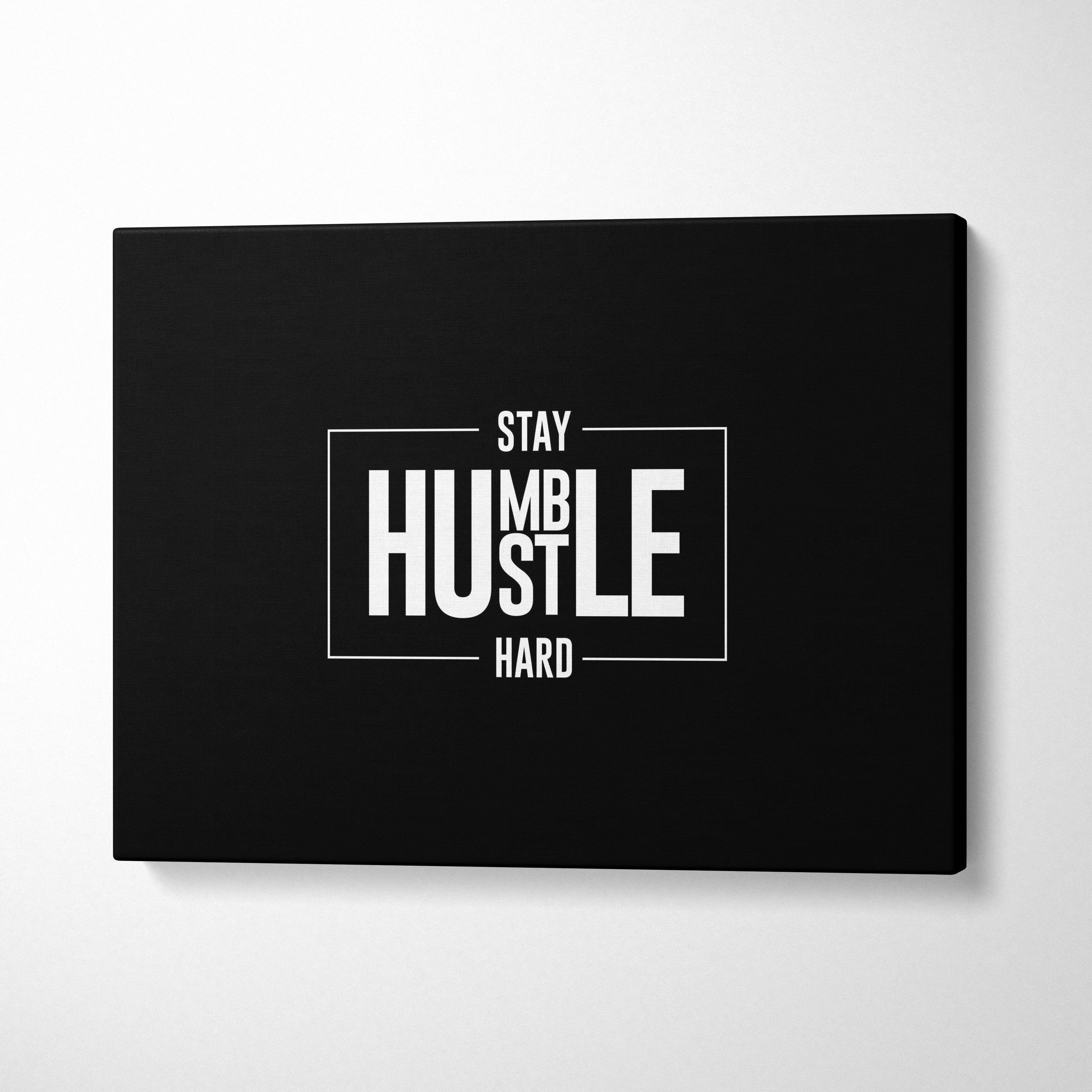 Black canvas print with white stay humble hustle hard text in minimalist frame motivational office wall art