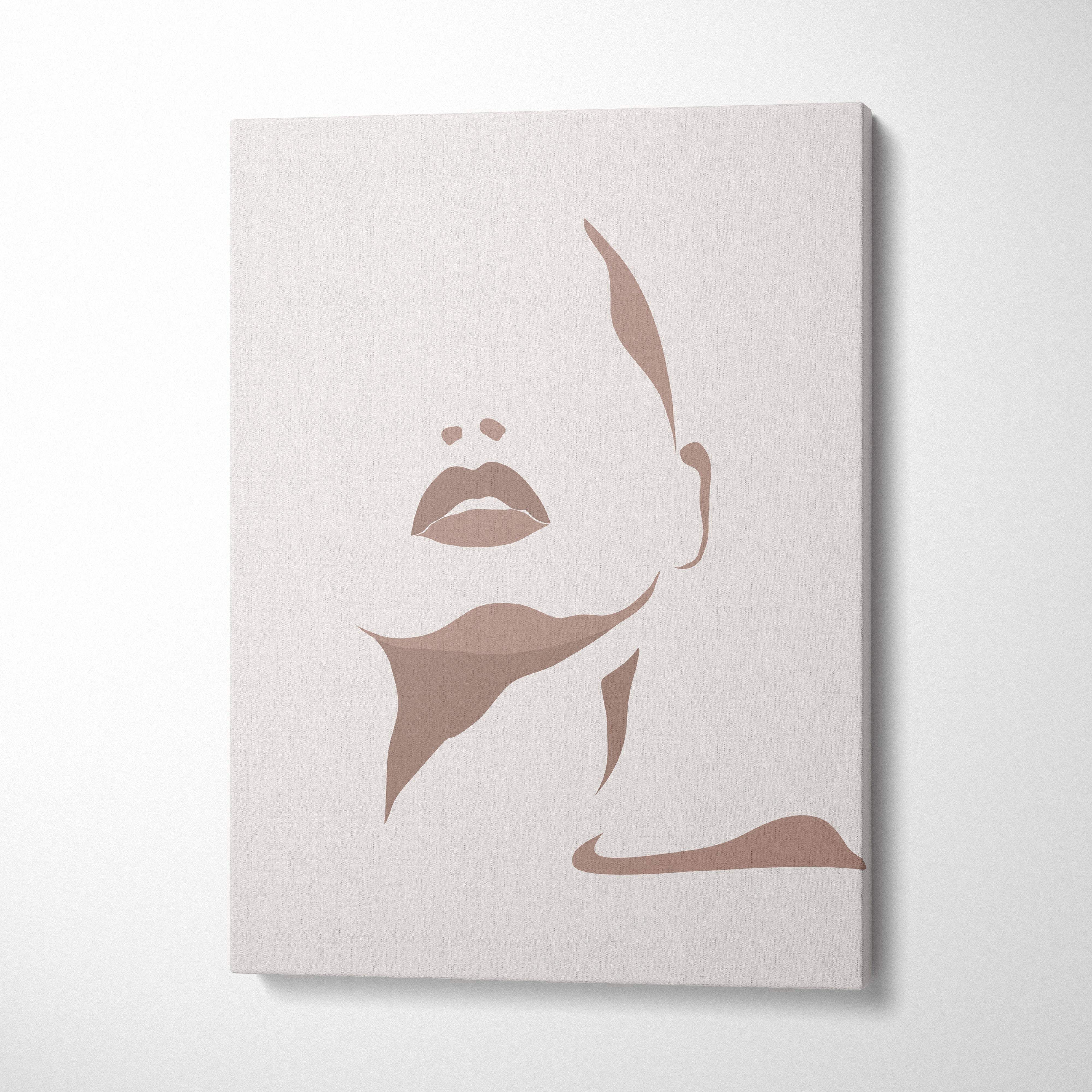 Beige canvas wall art featuring a minimalist silhouette of a woman’s face in neutral taupe tones for boho decor