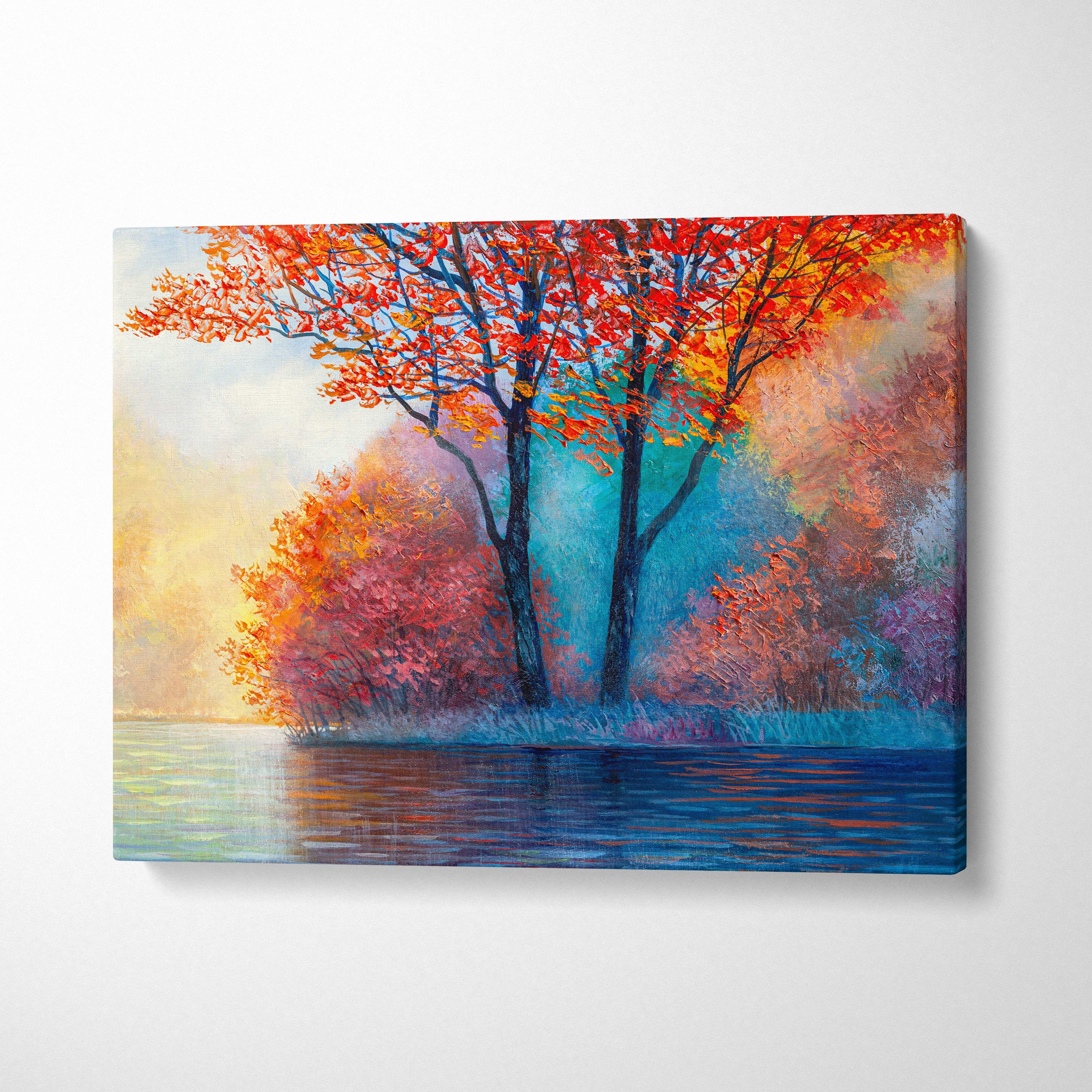 Vibrant autumn trees wall art canvas print featuring fiery orange and red fall foliage reflecting on calm lake water