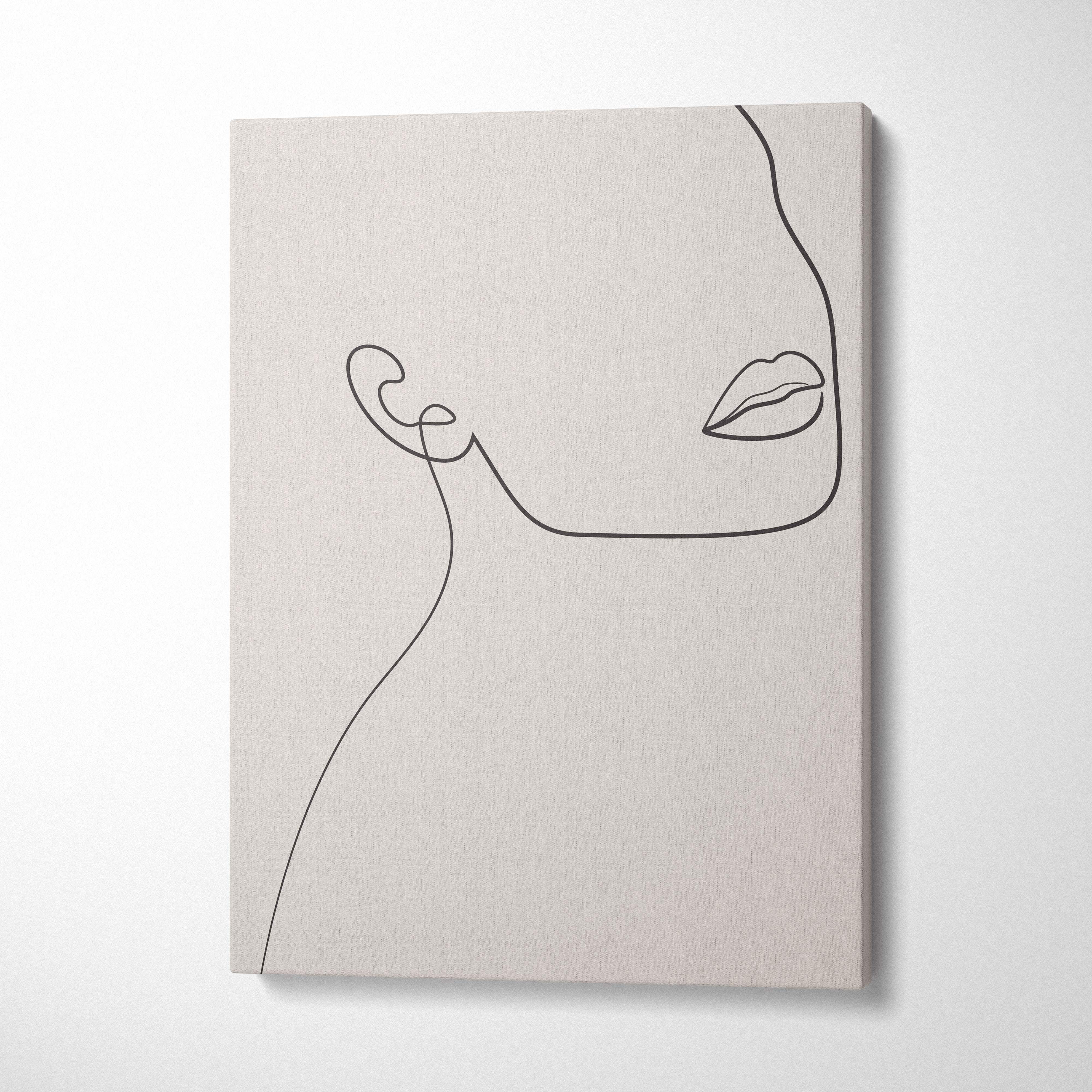 Boho minimalist line art face canvas wall art featuring a black line drawing on a neutral beige background for modern decor