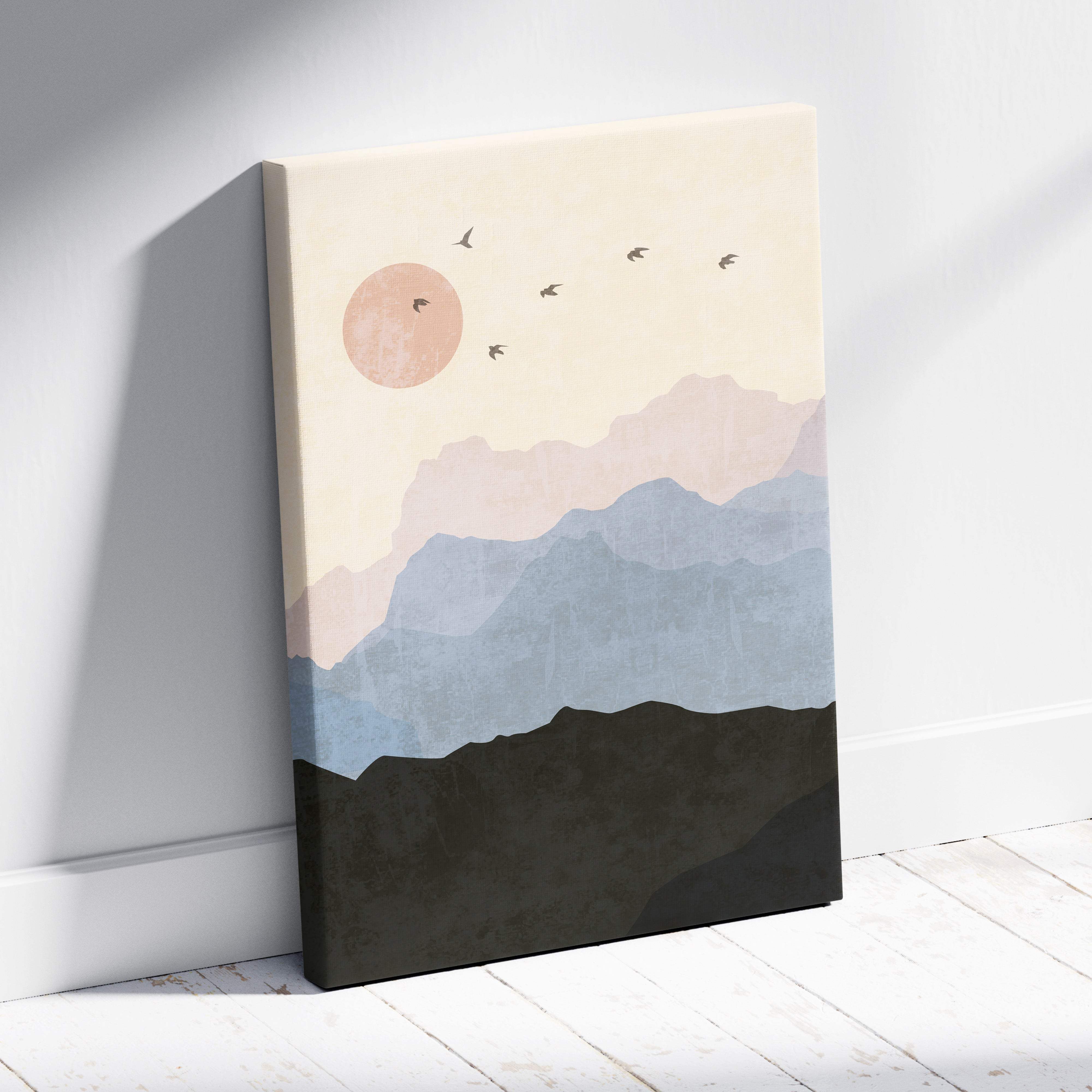 Boho mountain landscape canvas wall art with layered blue and charcoal mountains, peach sun, birds on beige background