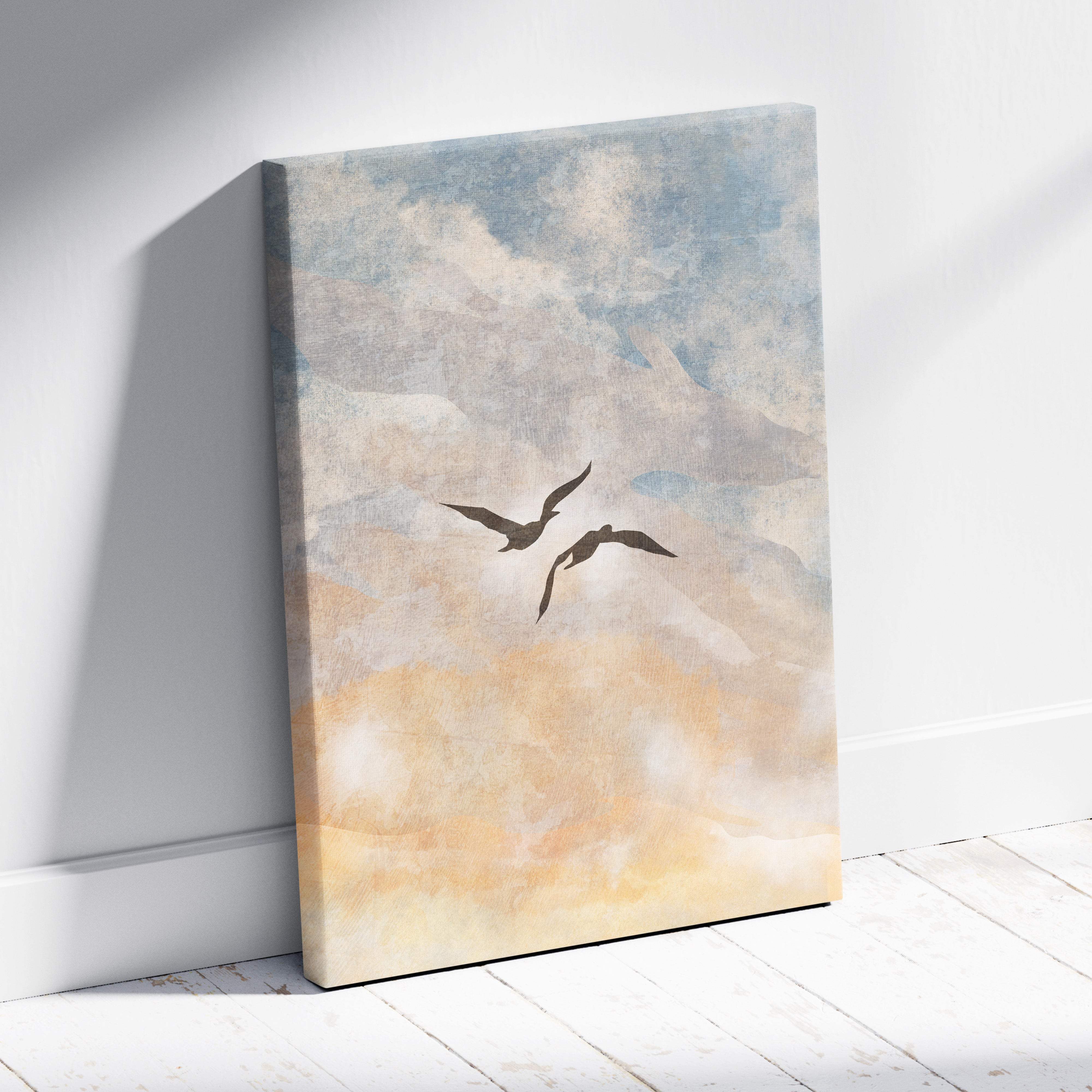 Boho coastal sky canvas wall art with two dark silhouetted birds against a soft blue and peach watercolor sky