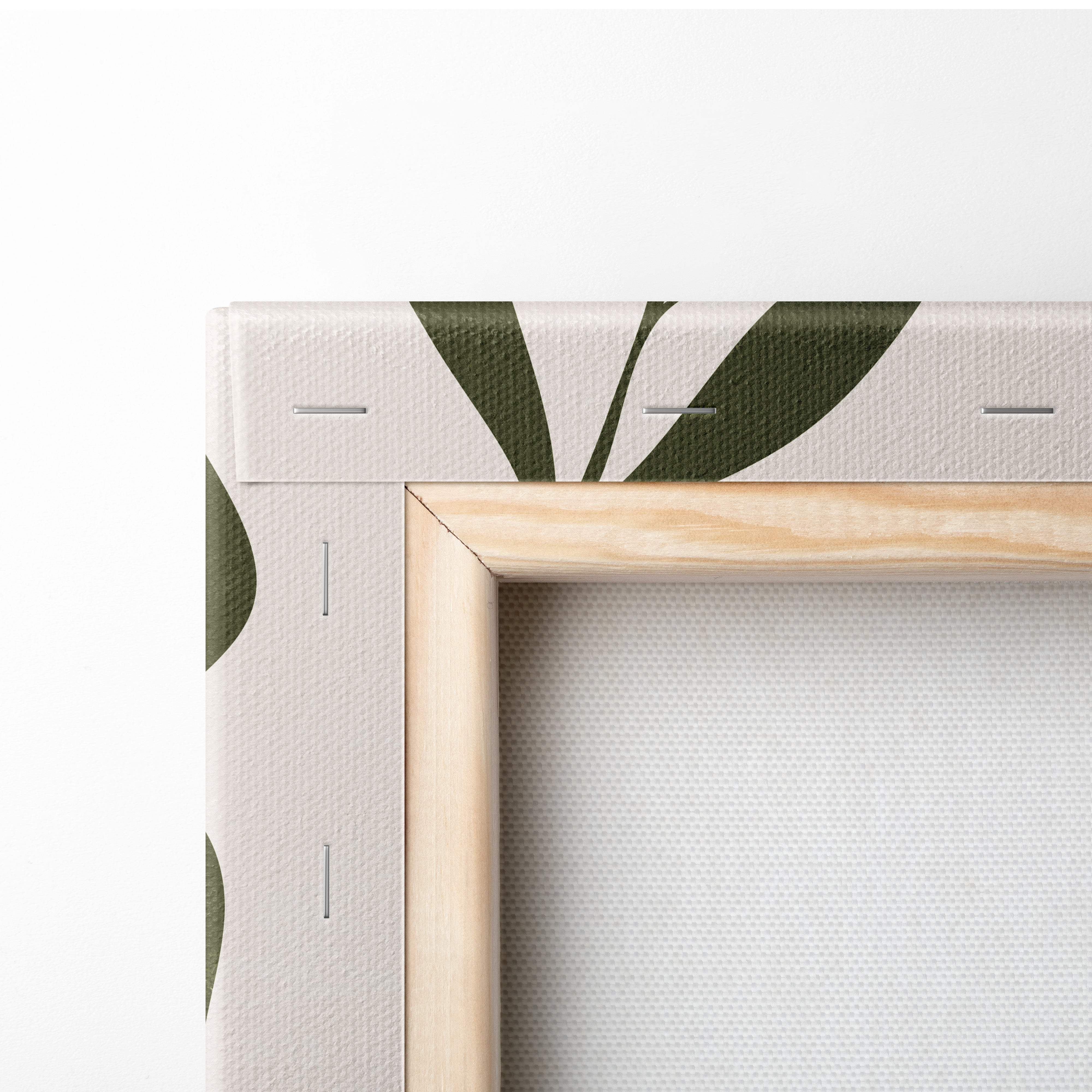 Minimalist canvas print with olive green leaf patterns on beige textured background in natural wood frame for boho decor
