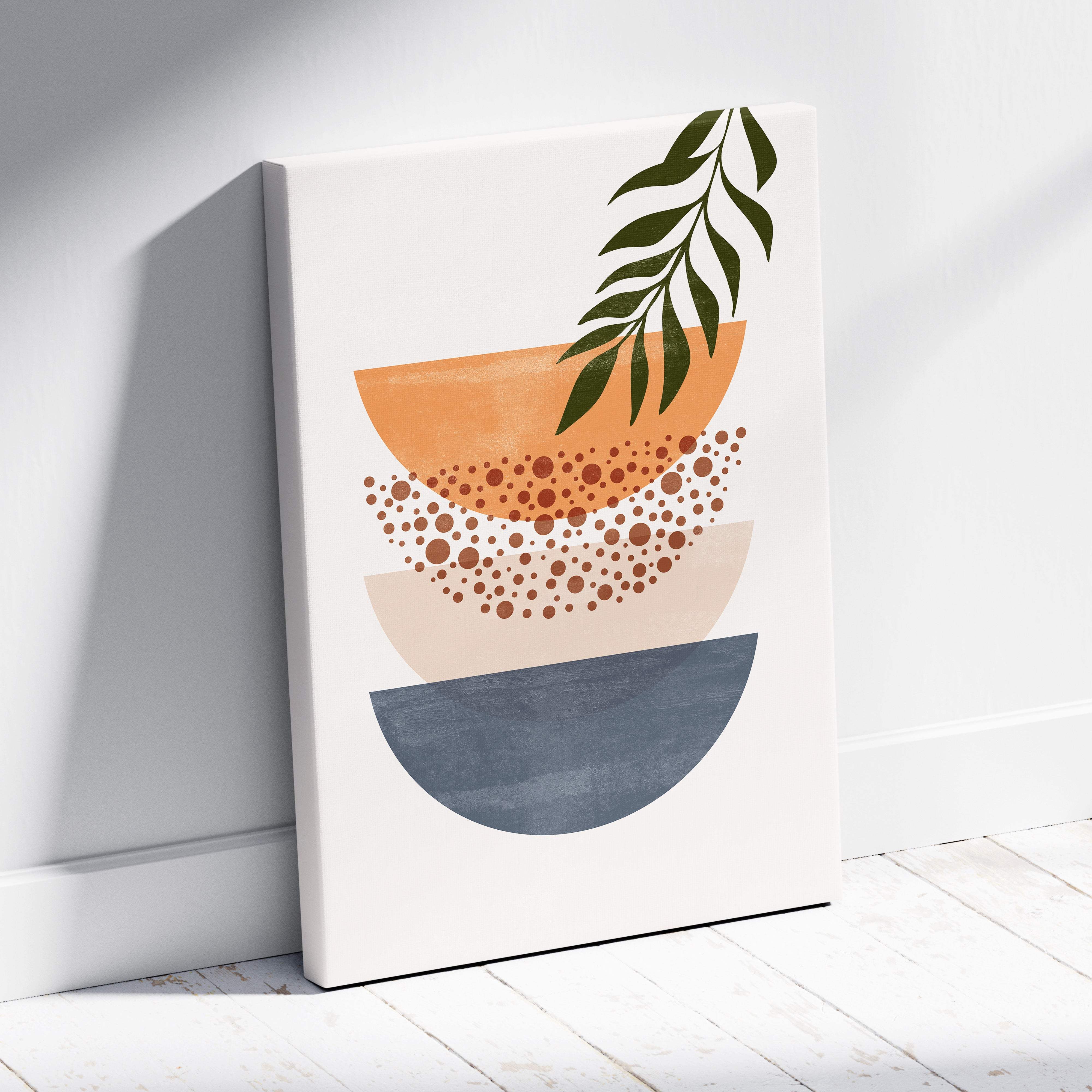 A modern abstract boho geometric canvas print with layered terracotta half circles and green botanical leaf for minimalist decor