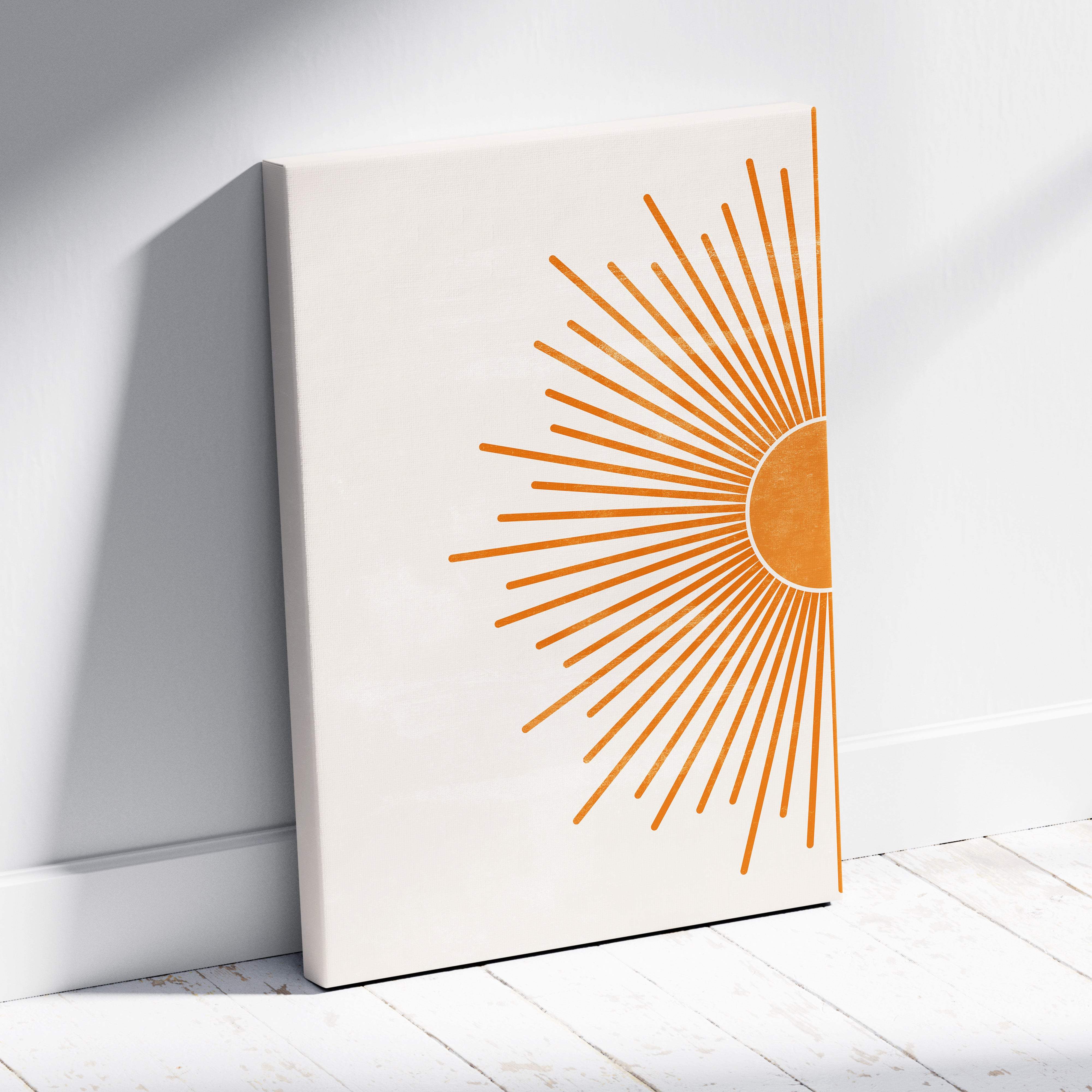 Minimalist canvas print featuring a stylized orange sunburst on cream background for boho midsize room decor