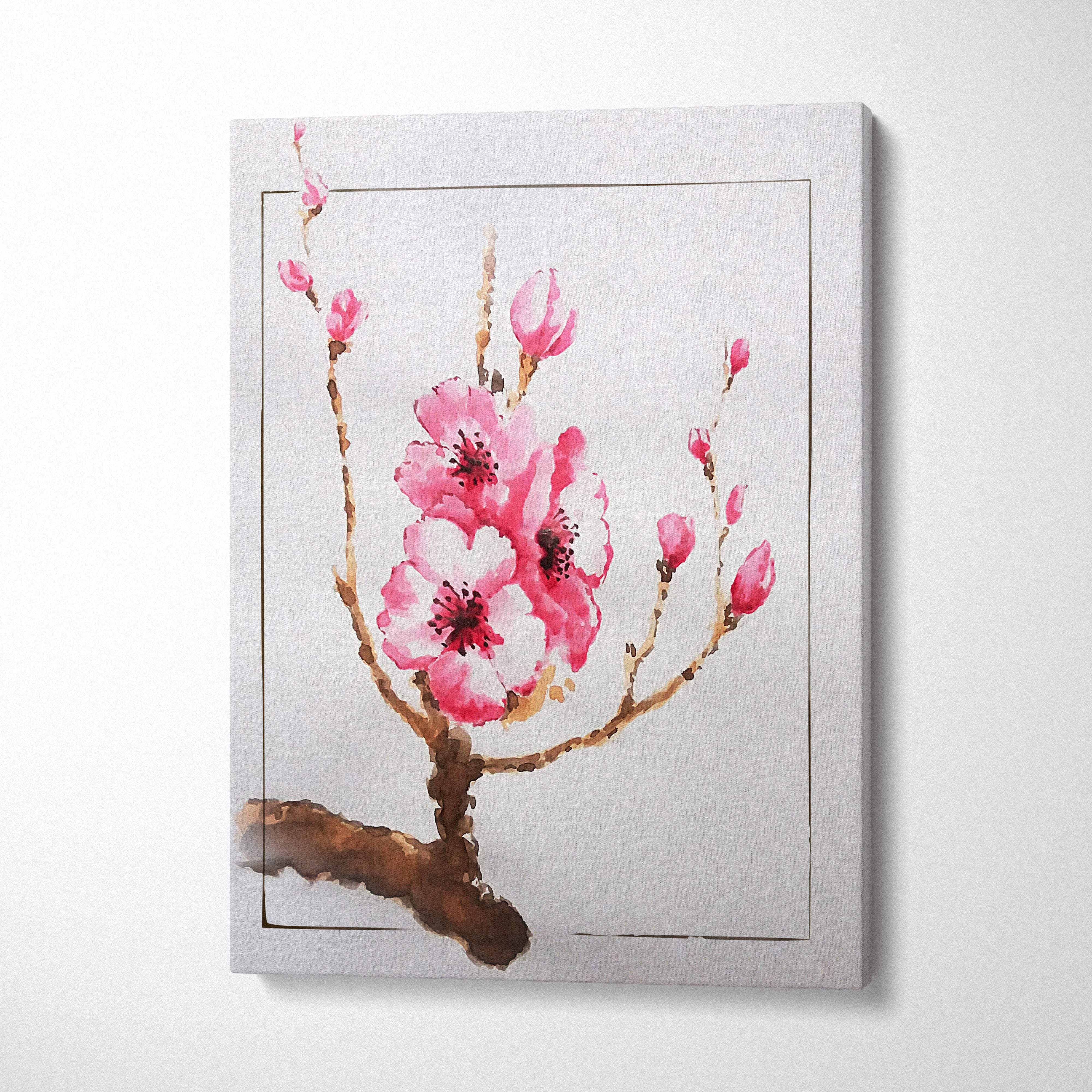 A framed pink cherry blossom watercolor painting on light gray canvas for soft zen floral bedroom or living room decor