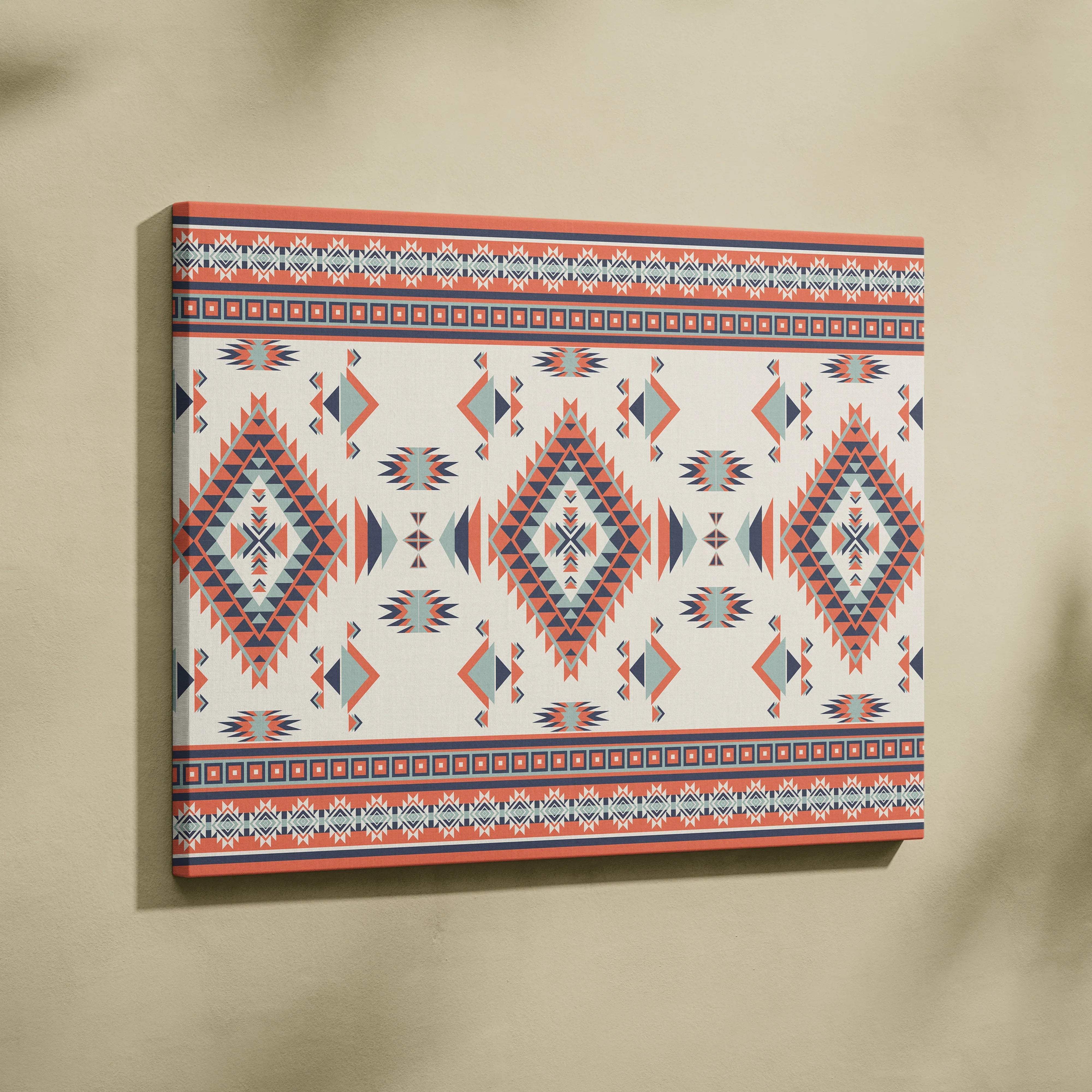 Southwestern tribal geometric diamond canvas art in coral navy cream