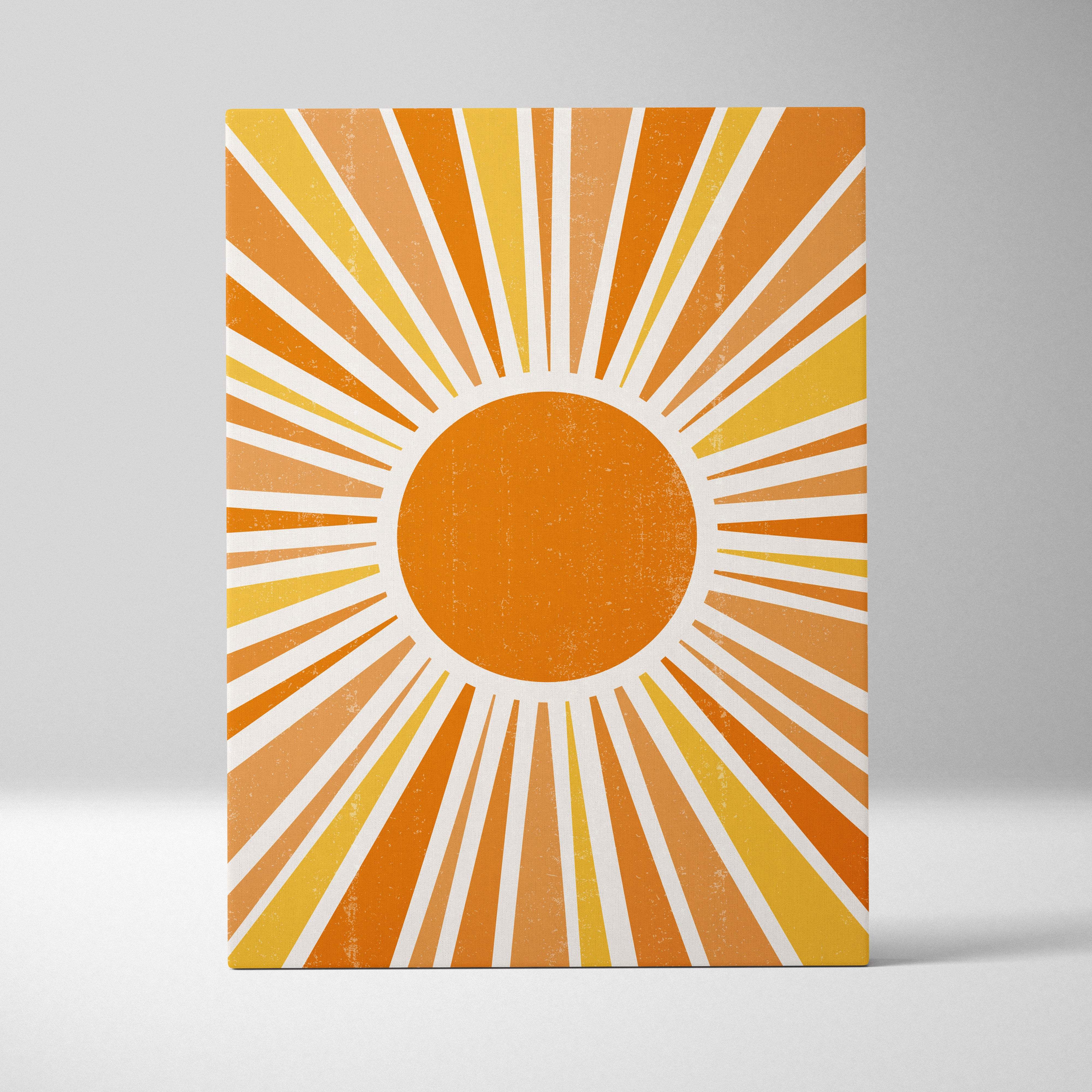 Vintage sunburst wall art canvas print featuring vibrant orange and yellow sunburst with white rays for boho decor
