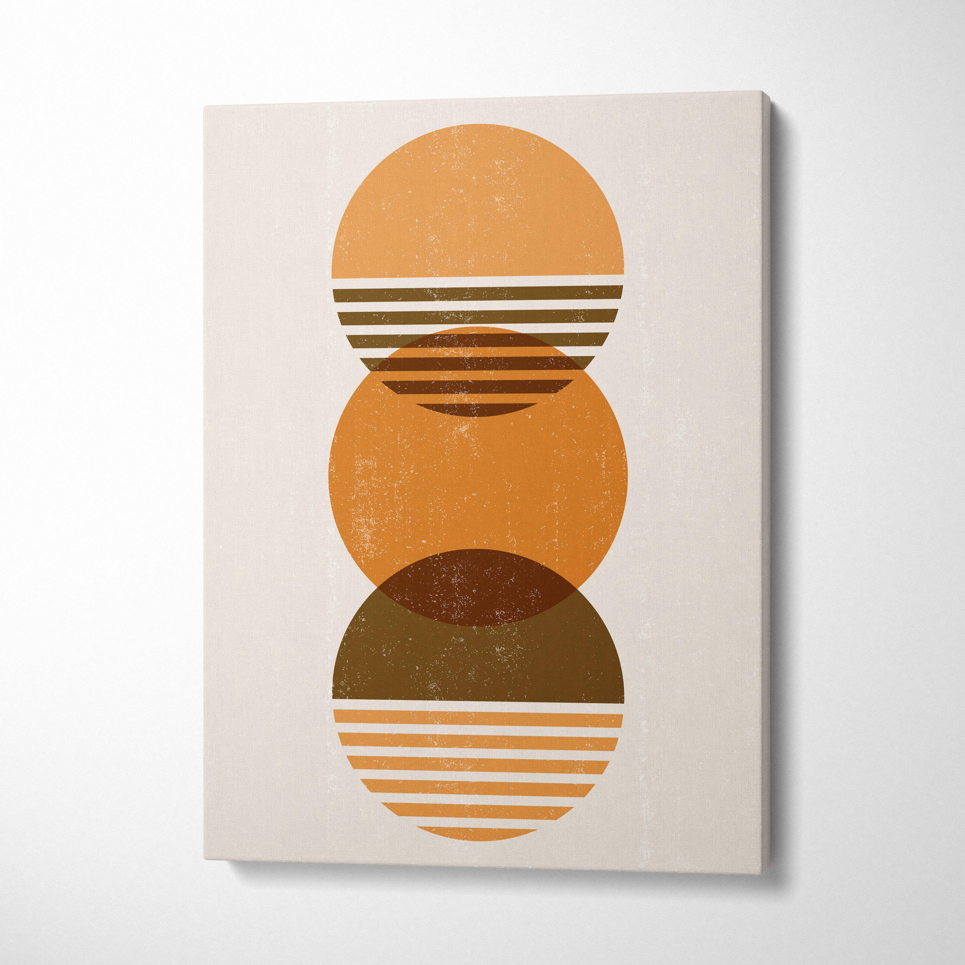 A minimalist canvas print featuring three overlapping horizontal striped circles in terracotta and ochre earth tones